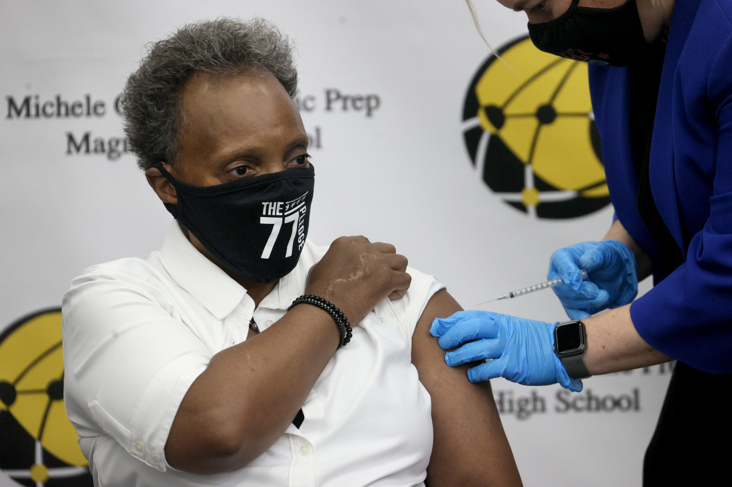 Chicago Mayor Lori Lightfoot gets a COVID-19 booster vaccine at Michele Clark High School on November 12, 2021 in Chicago, Illinois. (Photo by Scott Olson/Getty Images)