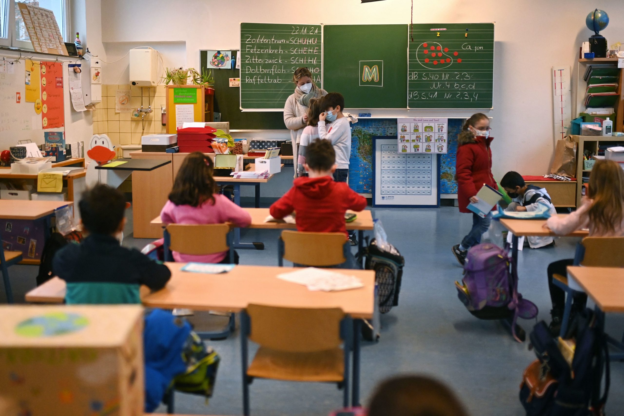 Children of a school class attend a lesson in their classroom at the Petri primary school in Dortmund, western Germany, on November 23, 2021 amid the novel coronavirus / COVID-19 pandemic. (Photo by INA FASSBENDER/AFP via Getty Images)