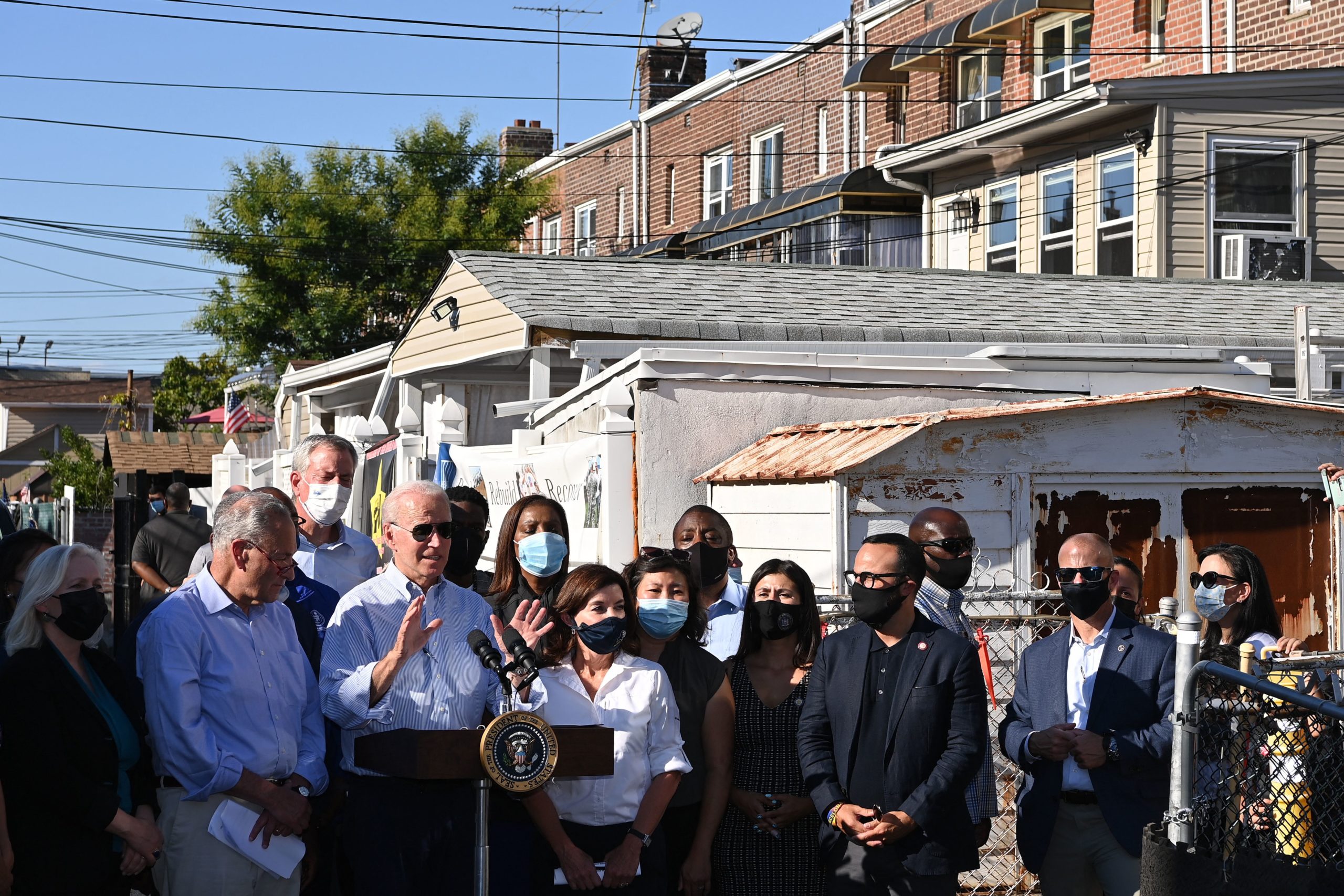 President Joe Biden speaks alongside other Democratic officials during a tour of a neighborhood affected by Hurricane Ida in Queens, New York on Sept. 7. (Mandel Ngan/AFP via Getty Images)