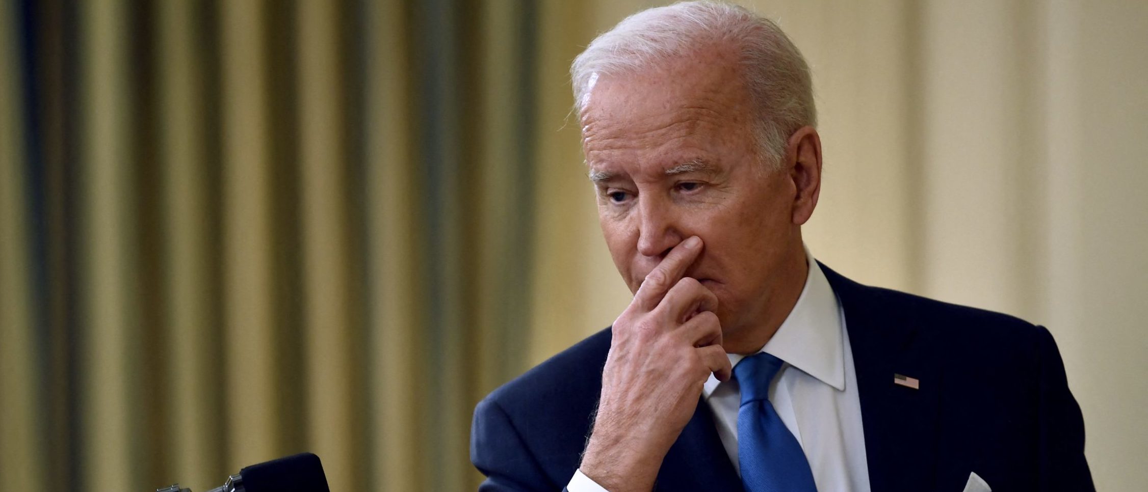 President Joe Biden answers questions after speaking about the status of the country's fight against COVID-19 on Tuesday. (Brendan Smialowski/AFP via Getty Images)