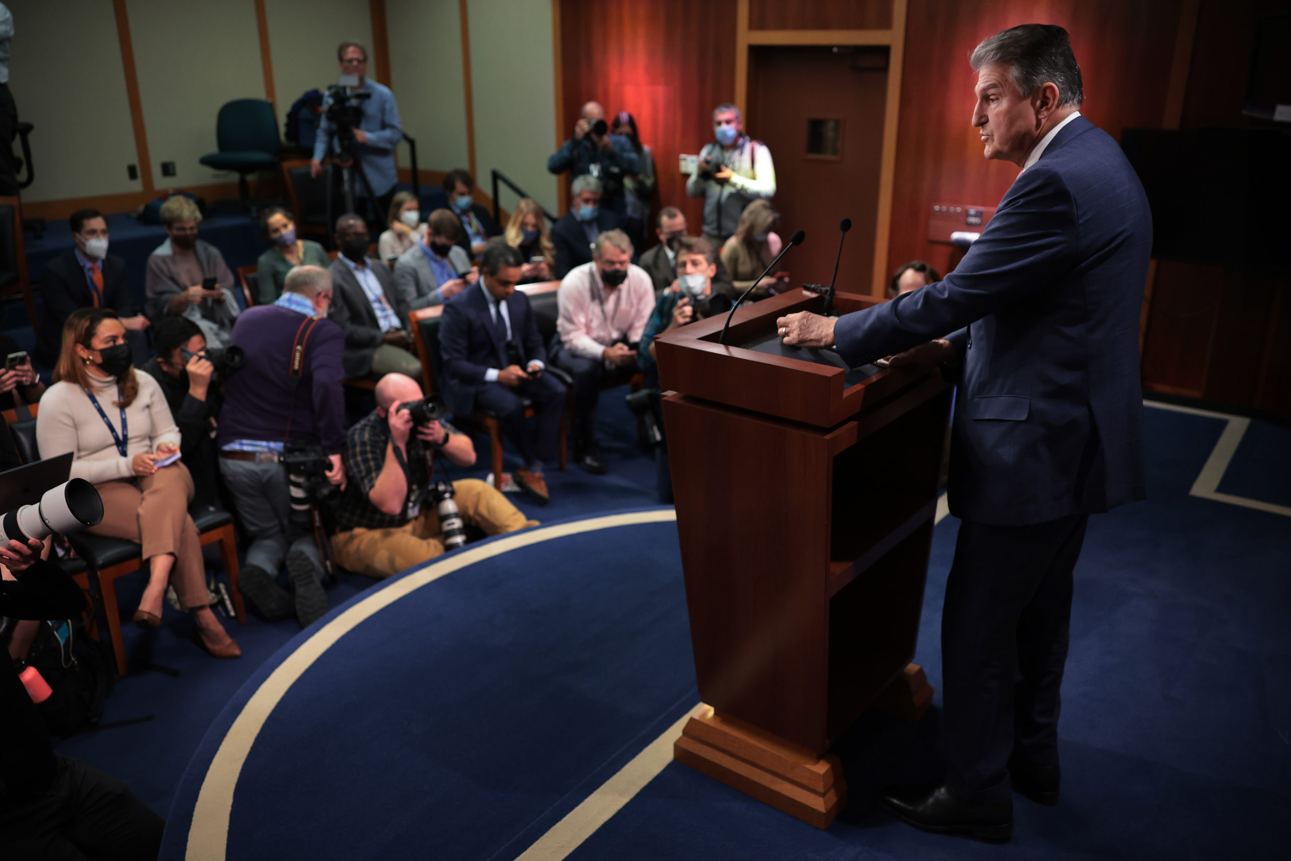 Sen. Joe Manchin talks to reporters at the Capitol on Nov. 1. (Chip Somodevilla/Getty Images)