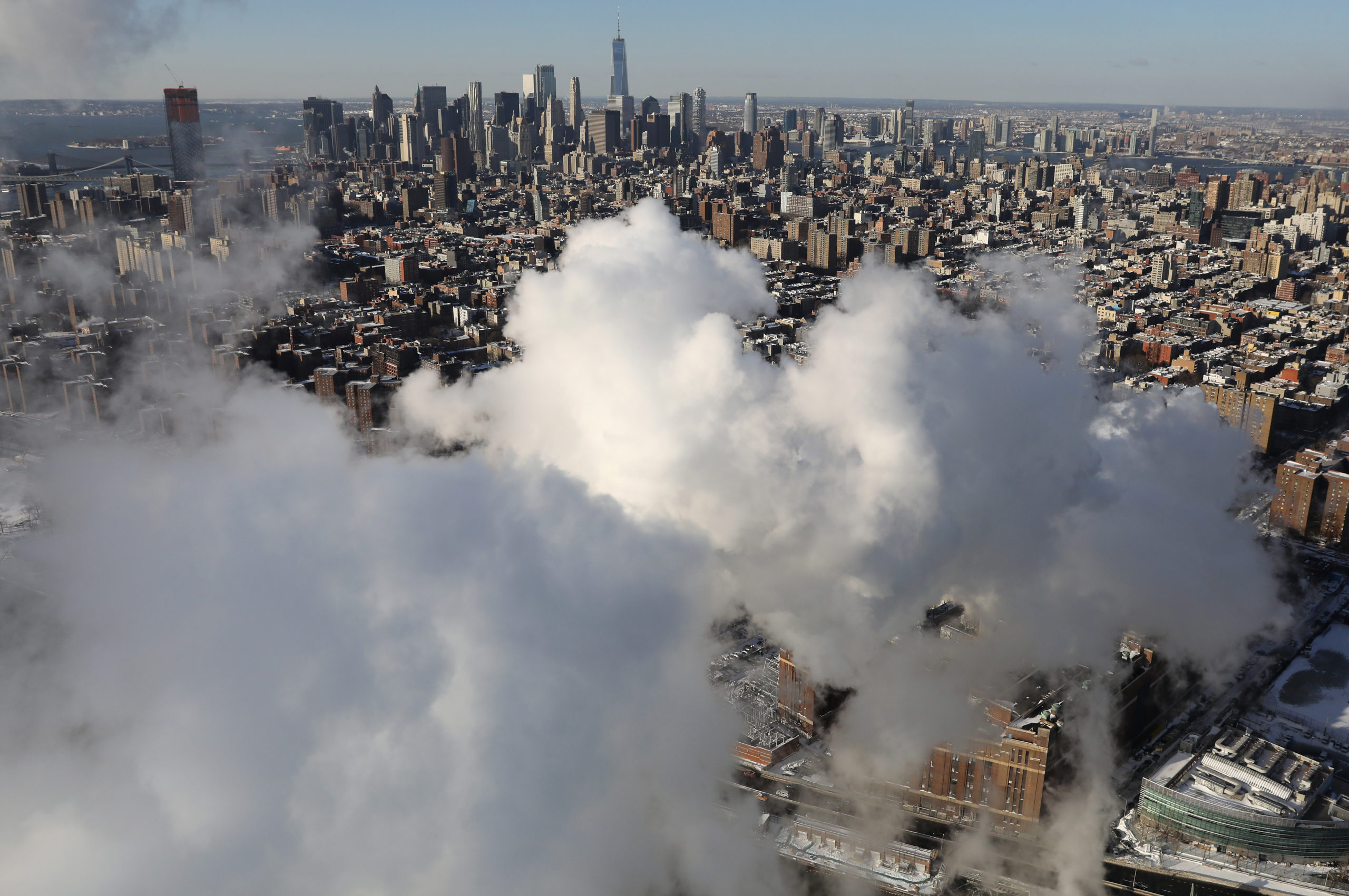 Steam rises from a power plant in 2018 in New York City. (John Moore/Getty Images)