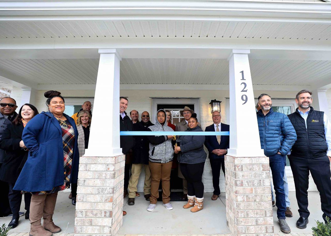 Ribbon cutting ceremony for Habitat's first 3D printed house (Image Source: Press Release)