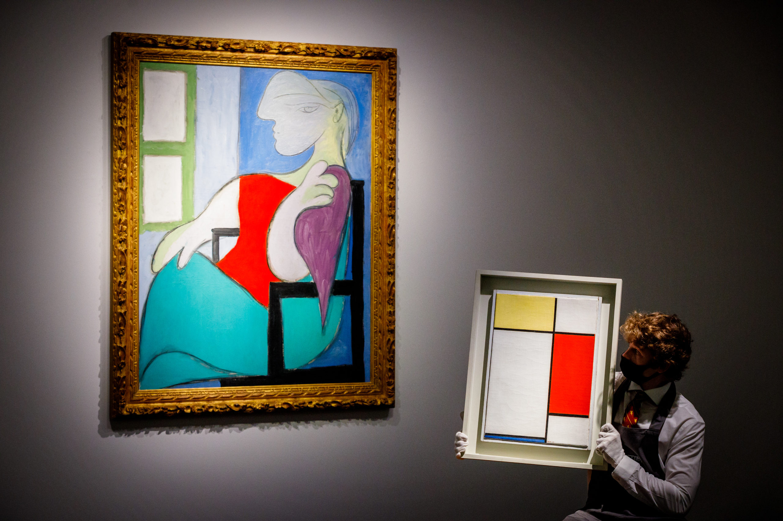 Pablo Picasso's Femme assise pres d'une fenetre (Marie-Therese) est. $55 million and Piet Mondrian's Composition: No. II, with Yellow, Red and Blue, est. $25 million, go on view to the public at Christie's on April 22, 2021 in London, England. (Photo by Tristan Fewings/Getty Images)