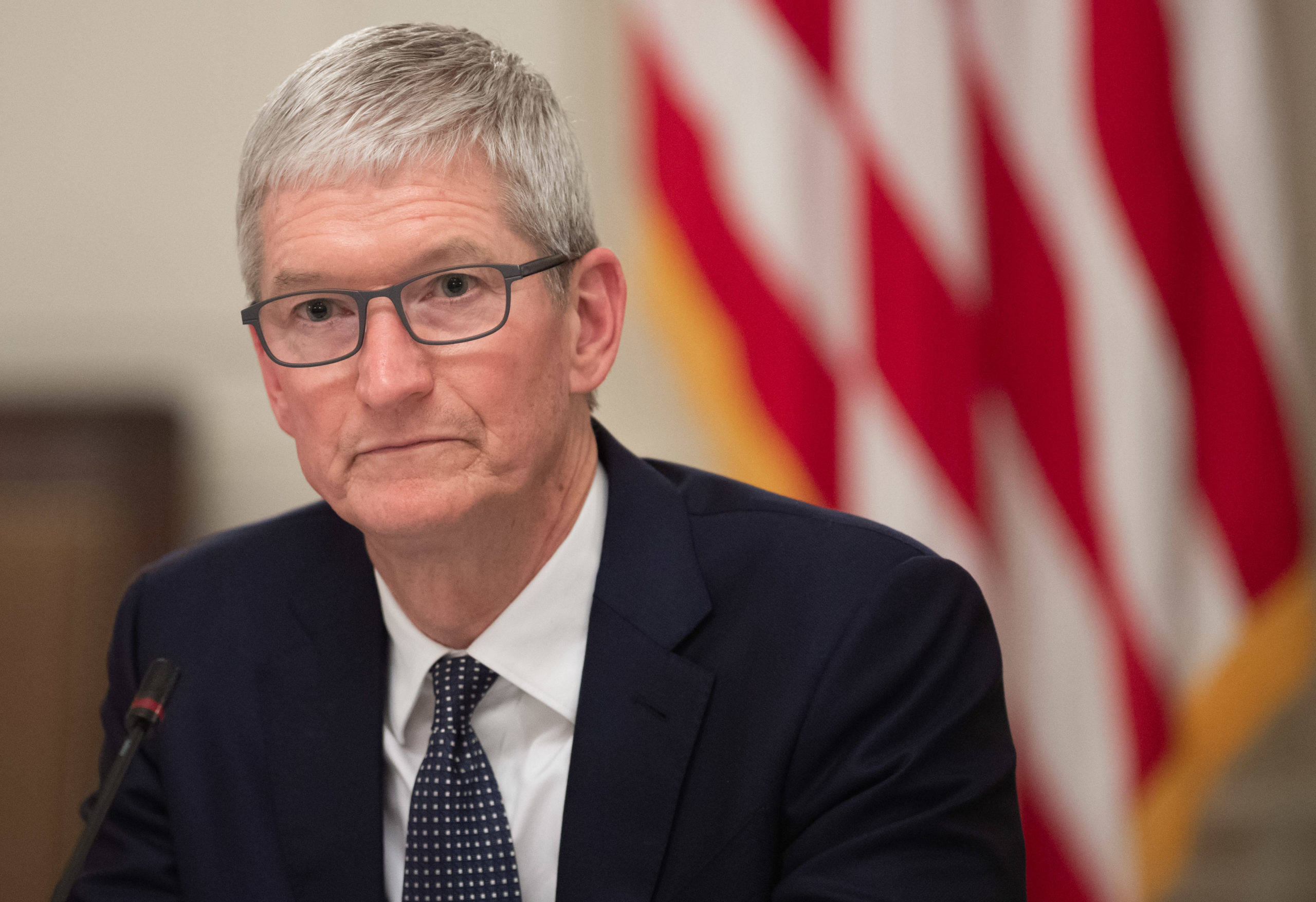 Apple CEO Tim Cook attends the first meeting of the American Workforce Policy Advisory Board with US President Donald Trump in the State Dining Room of the White House in Washington, DC, March 6, 2019. (Photo by SAUL LOEB / AFP) 