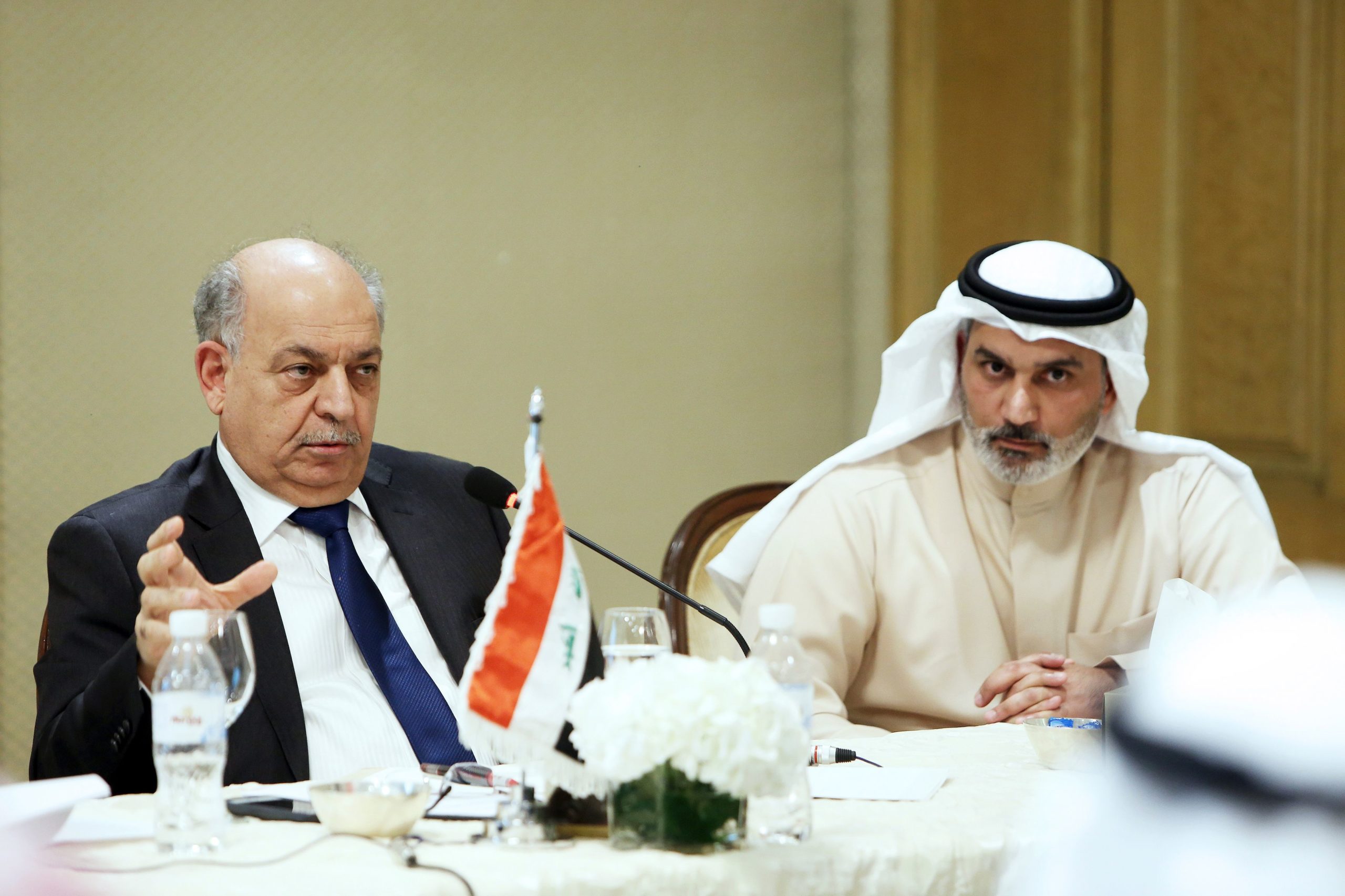 Iraqi oil minister Thamer Ghadban speaks as OPEC's top diplomat Haitham al-Ghais looks on during a joint press conference in Kuwait City on Dec. 23, 2018. (Yasser Al-Zayyat/AFP via Getty Images)