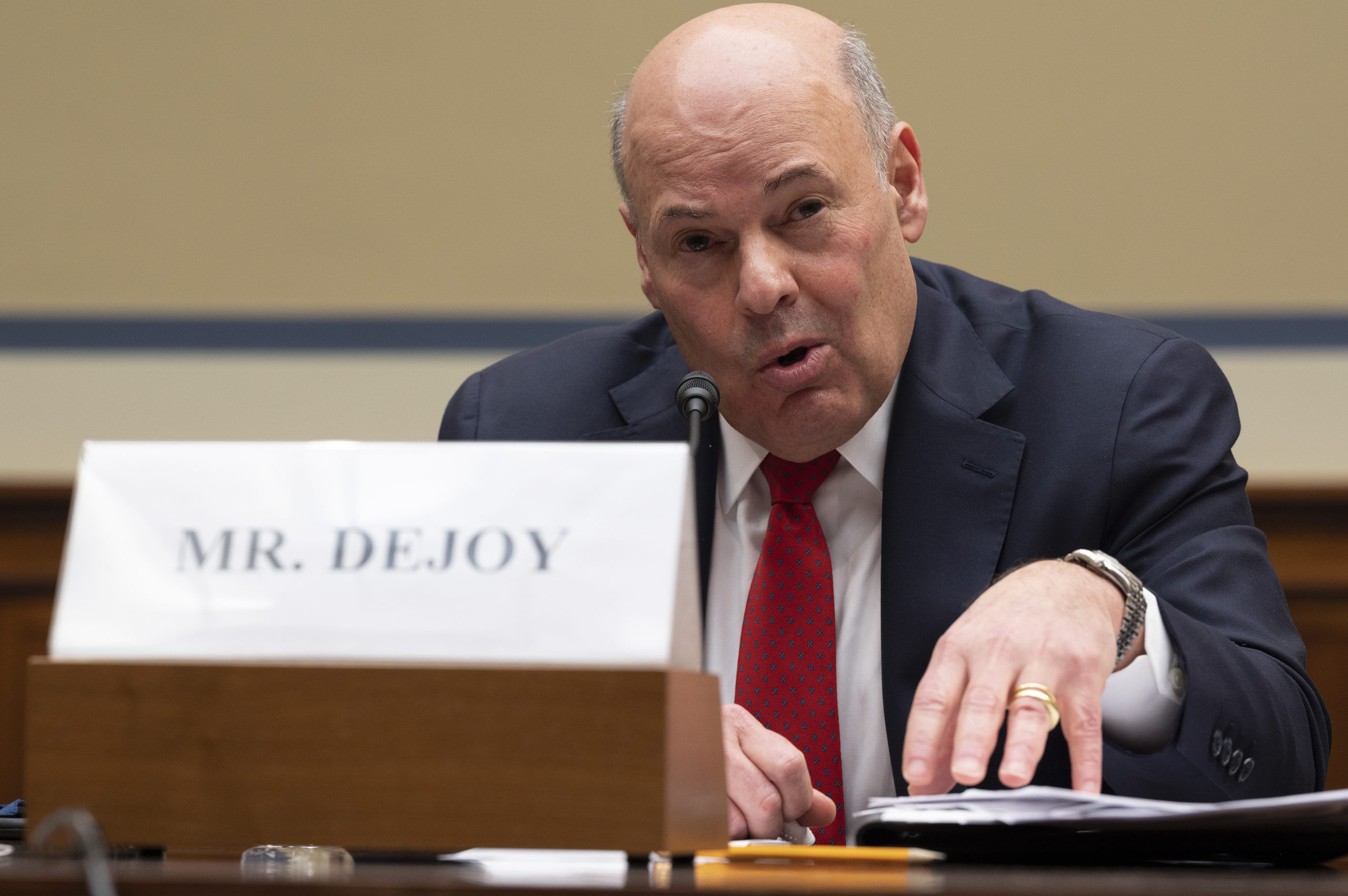 USPS Postmaster General Louis DeJoy testifies during a House Oversight and Reform Committee hearing on Feb. 24 on Capitol Hill. (Jim Watson/Pool/Getty Images)