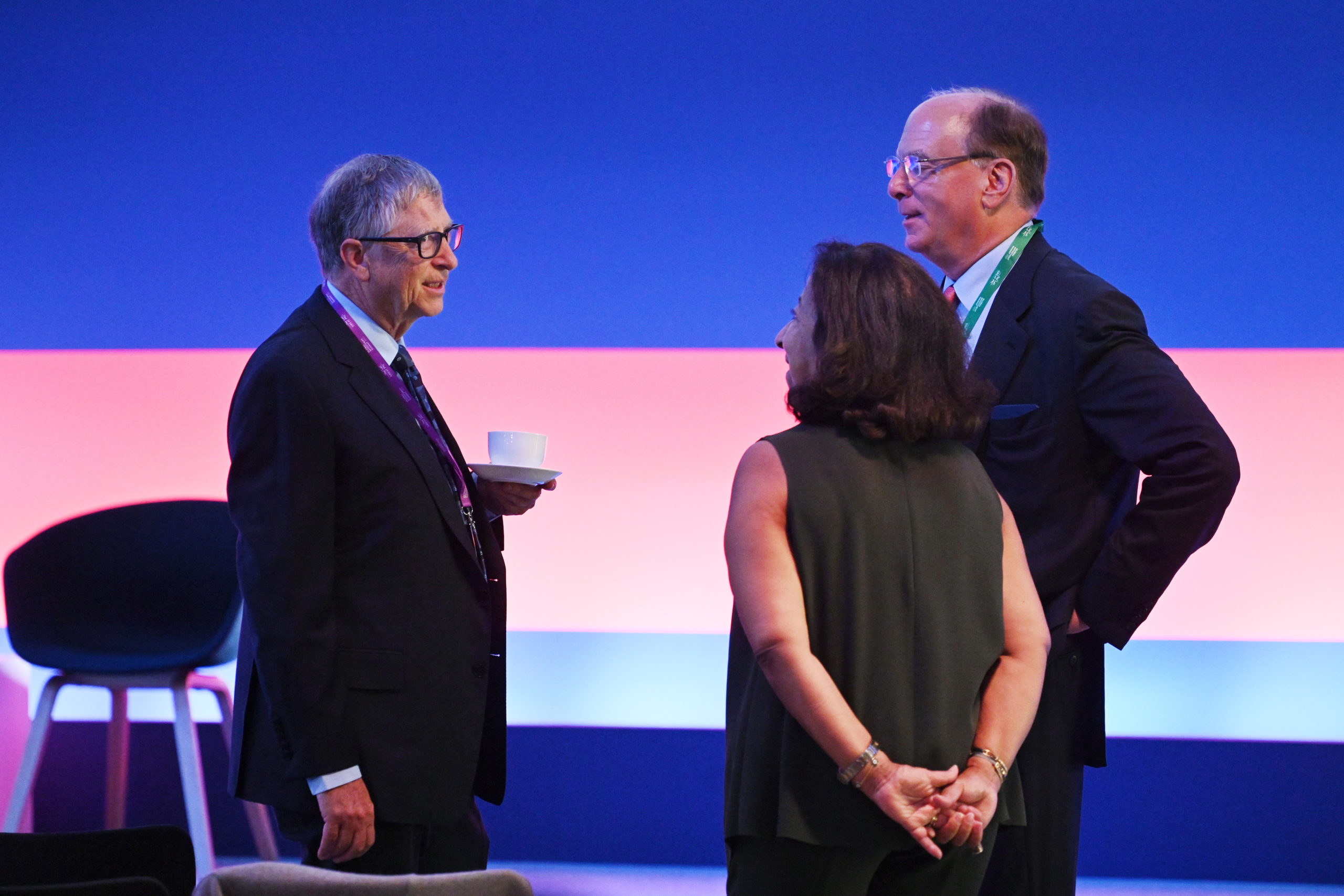 American businessmen Bill Gates speaks with Larry Fink prior to the Global Investment Summit at the Science Museum on Oct. 19 in London, England. (Leon Neal/WPA Pool /Getty Images)