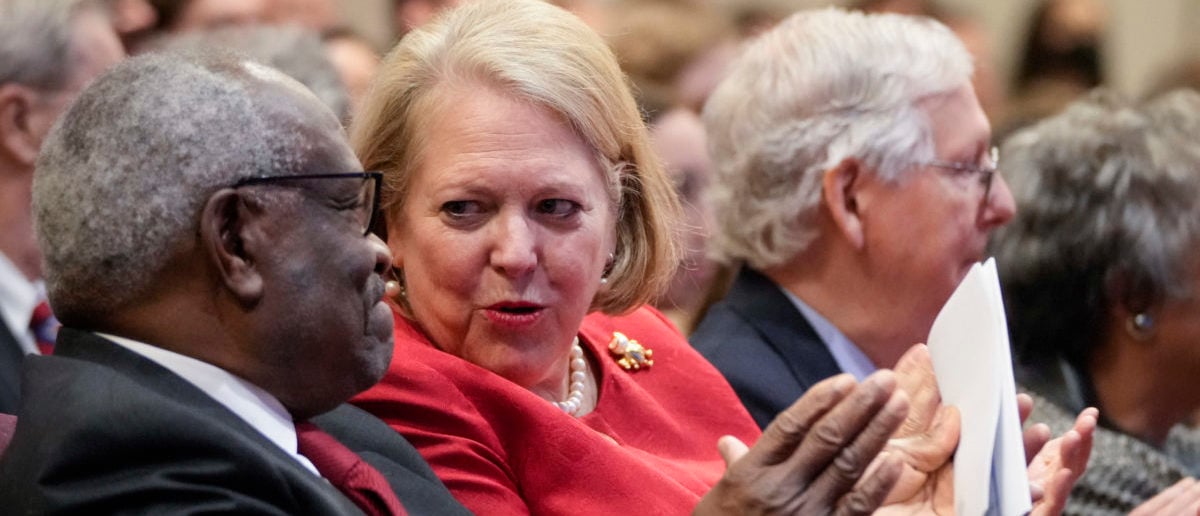 WASHINGTON, DC - OCTOBER 21: (L-R) Associate Supreme Court Justice Clarence Thomas sits with his wife and conservative activist Virginia Thomas while he waits to speak at the Heritage Foundation on October 21, 2021 in Washington, DC. Clarence Thomas has now served on the Supreme Court for 30 years. He was nominated by former President George H. W. Bush in 1991 and is the second African-American to serve on the high court, following Justice Thurgood Marshall. (Photo by Drew Angerer/Getty Images)