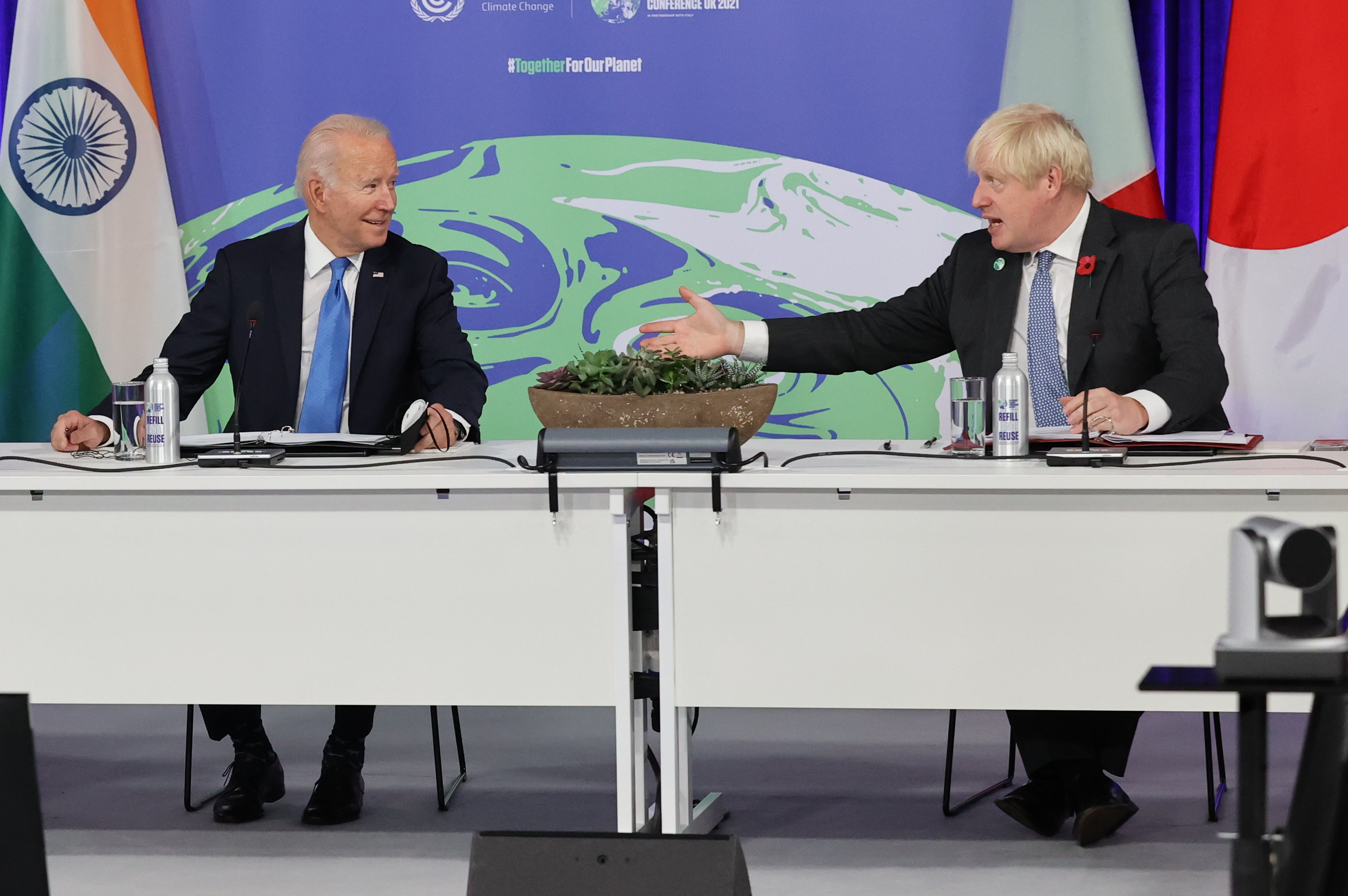 President Joe Biden and British Prime Minister Boris Johnson attend a meeting on Nov. 2 at the United Nations climate conference in Glasgow, United Kingdom. (Steve Reigate/Pool/Getty Images)