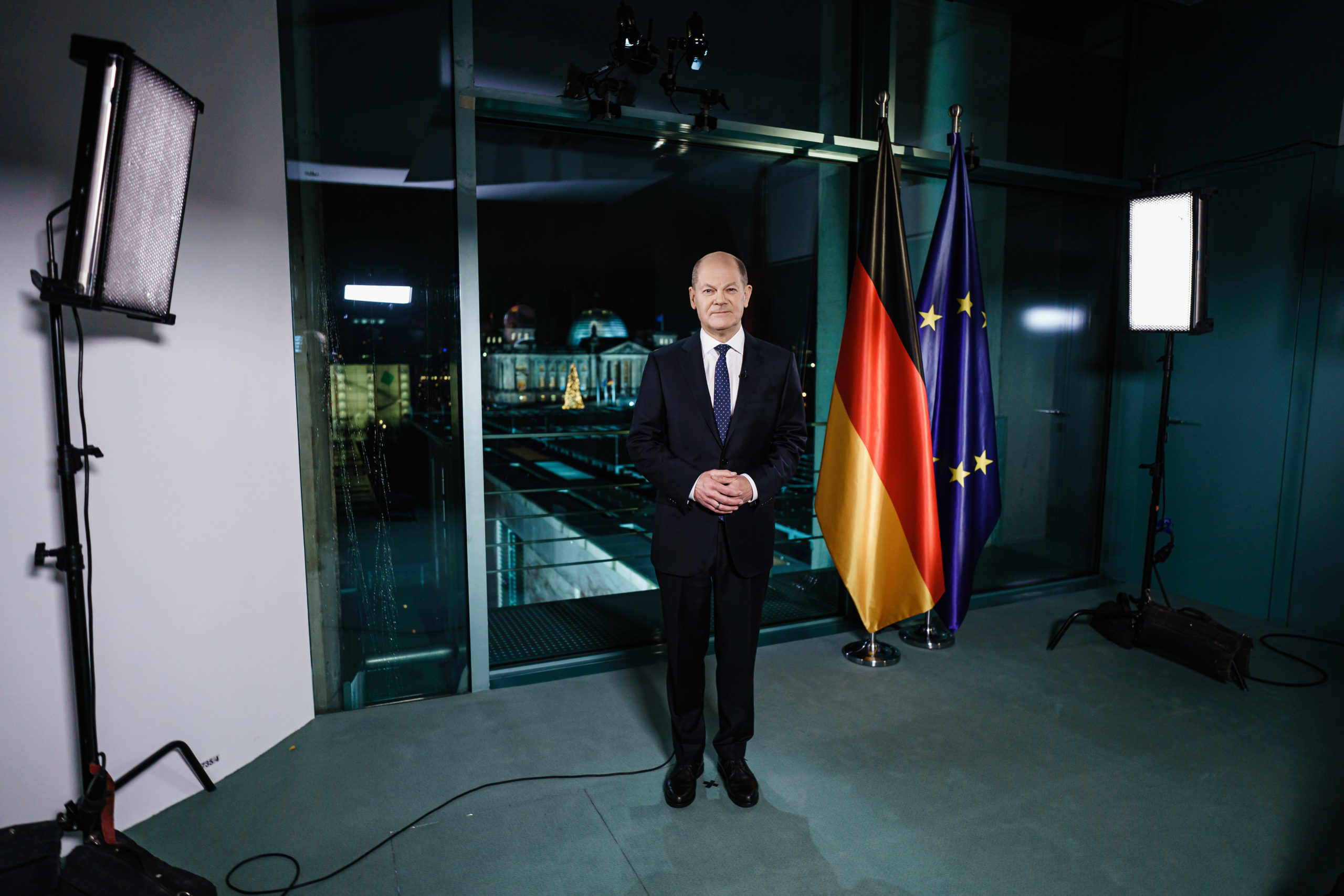 German Chancellor Olaf Scholz poses for photographs after giving a New Year speech on Dec. 30 in Berlin, Germany. (Clemens Bilan/Pool/Getty Images)