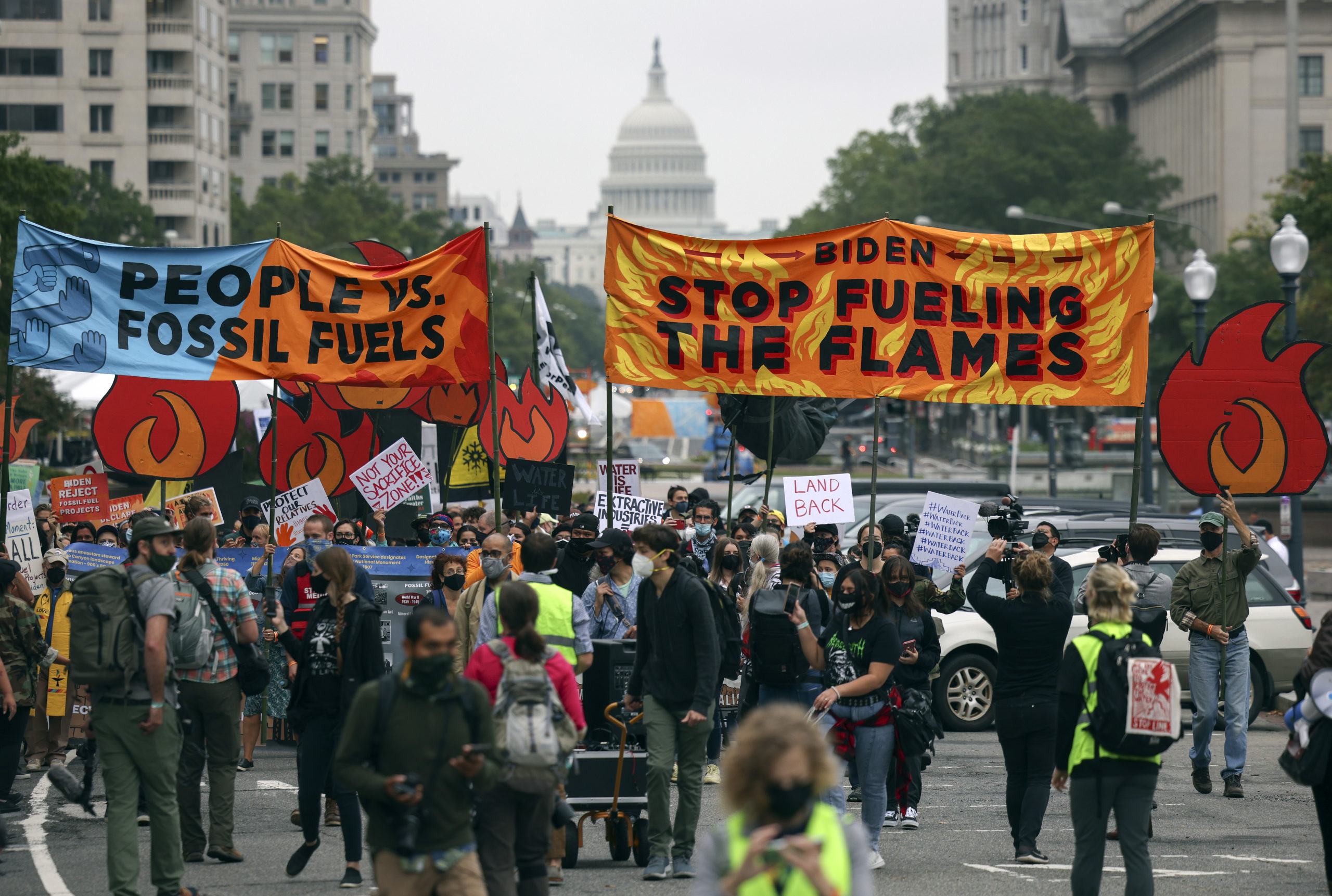 Climate protesters march to the White House on Oct. 12 in Washington, D.C. (Kevin Dietsch/Getty Images)