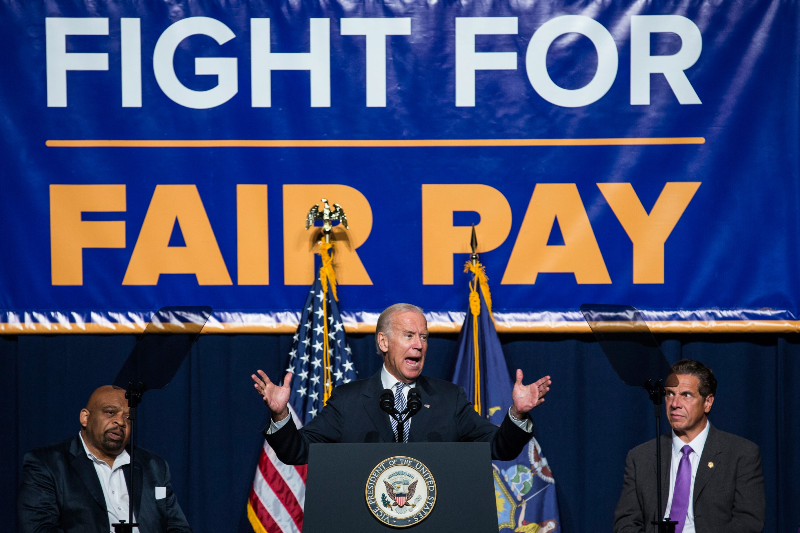 NEW YORK, NY - SEPTEMBER 10: Then-U.S. Vice President Joe Biden (C) speaks in support of raising the minimum wage for the state of New York to $15 per hour on September 10, 2015 in New York City. Biden said he would like to see the federal minimum wage risen to $12 per hour. (Photo by Andrew Burton/Getty Images)