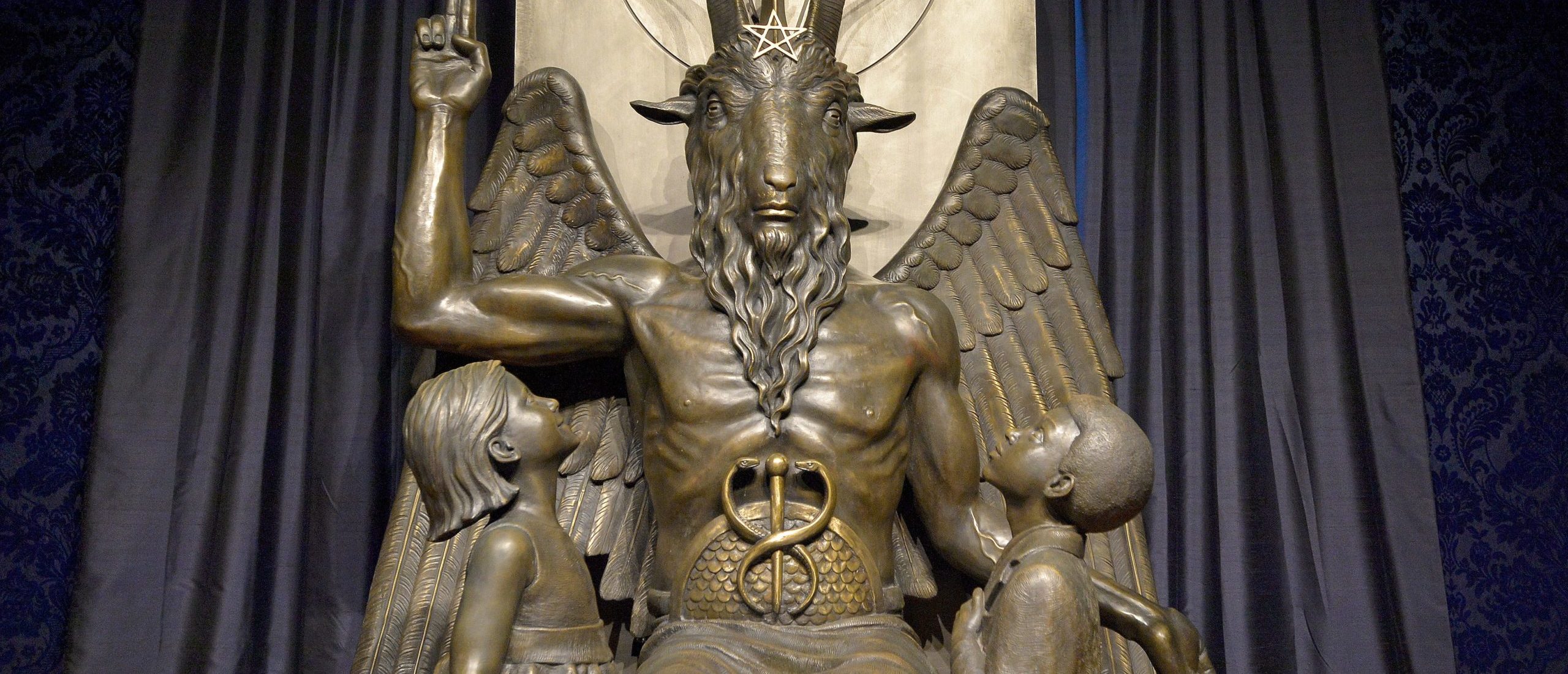 The Baphomet statue is seen in the conversion room at the Satanic Temple where a "Hell House" is being held in Salem, Massachusett on October 8, 2019. - The Hell House was a parody on a Christian Conversion centre meant to scare atheist and other Satanic Church members. (Photo by Joseph Prezioso / AFP) (Photo by JOSEPH PREZIOSO/AFP via Getty Images)