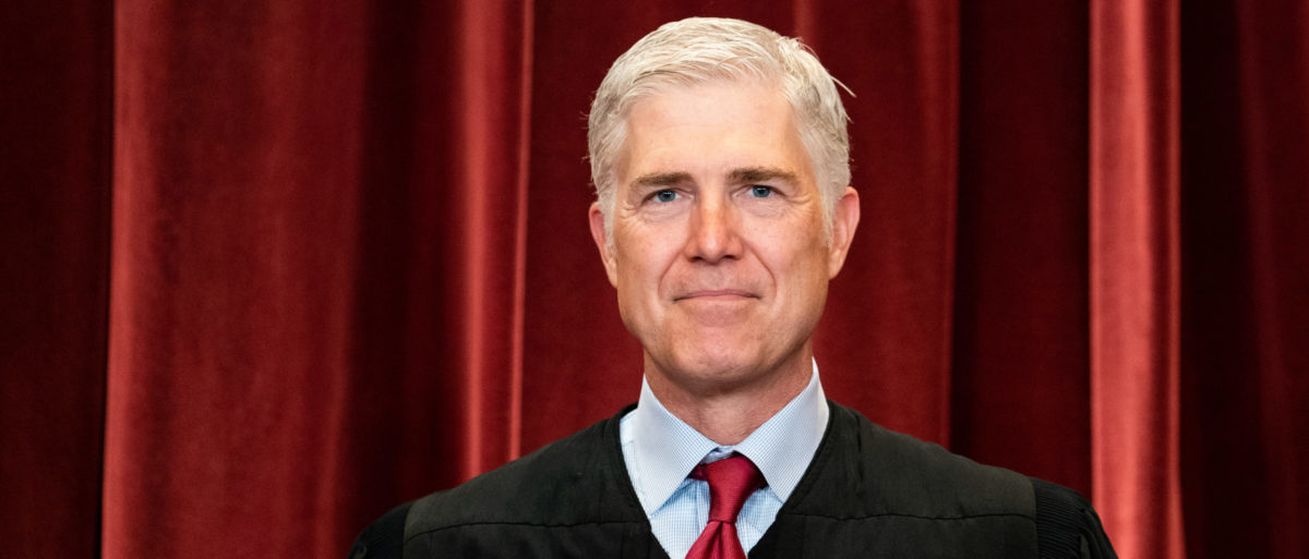 WASHINGTON, DC - APRIL 23: Associate Justice Neil Gorsuch stands during a group photo of the Justices at the Supreme Court in Washington, DC on April 23, 2021. (Photo by Erin Schaff-Pool/Getty Images)