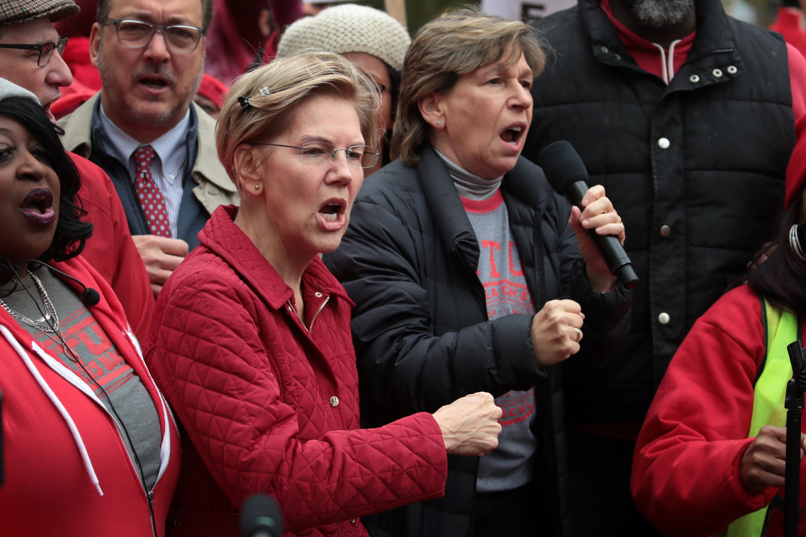 Democratic presidential candidate Sen. Elizabeth Warren (D-MA) (L) and American Federation of Teachers (AFT) president Randi Weingarten visit with striking Chicago teachers at Oscar DePriest Elementary School on October 22, 2019 in Chicago, Illinois. About 25,000 Chicago school teachers went on strike last week after the Chicago Teachers Union (CTU) failed to reach a contract agreement with the city. With about 300,000 students, Chicago has the third largest public school system in the nation. (Photo by Scott Olson/Getty Images)