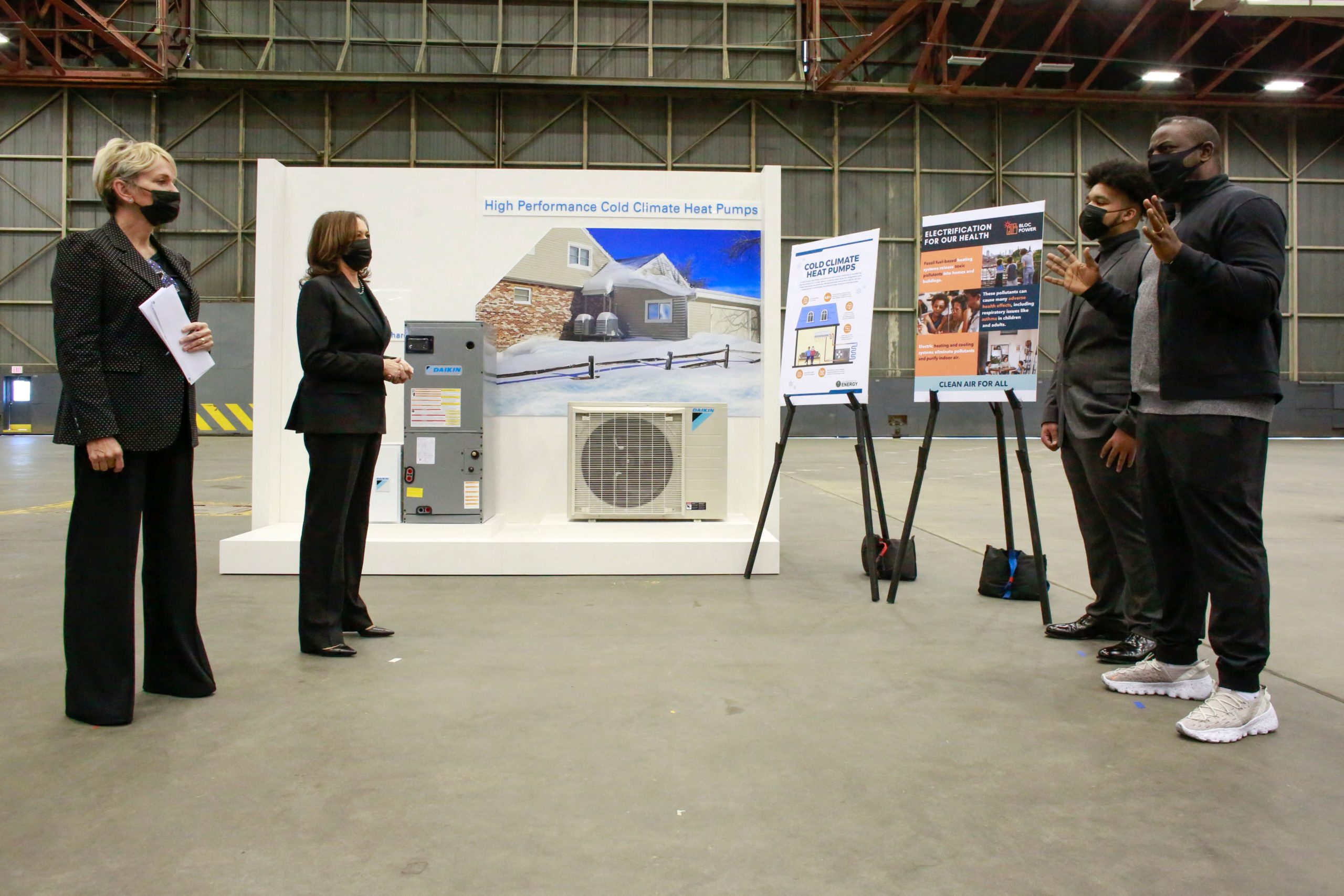 Vice President Kamala Harris and Energy Secretary Jennifer Granholm listen during a presentation of a climate friendly home heating project in New York on Nov. (Kena Betancur/AFP via Getty Images)