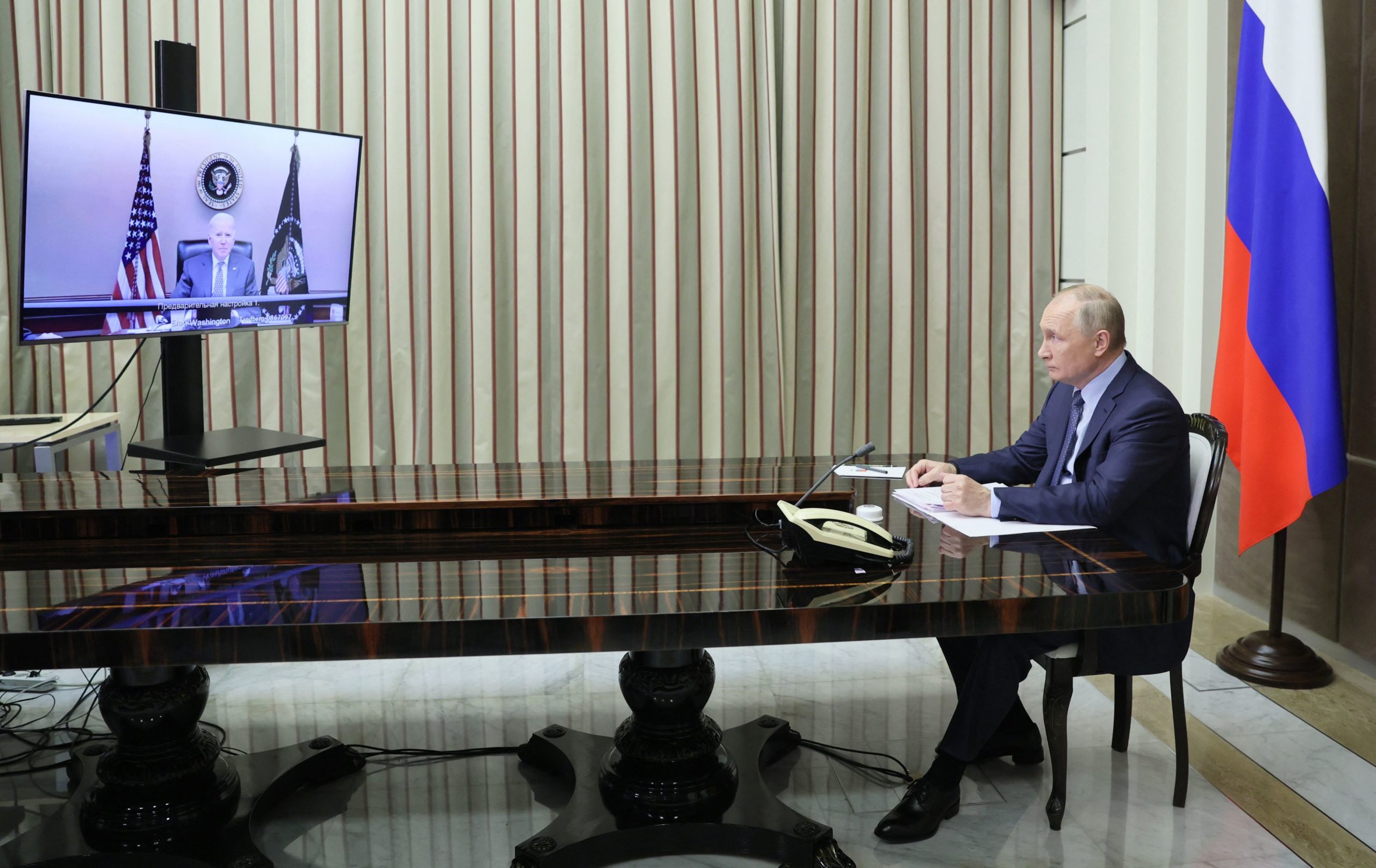 Russian President Vladimir Putin attends a virtual meeting with President Joe Biden on Dec. 7. (Mikhail Metzel/Sputnik/AFP via Getty Images)