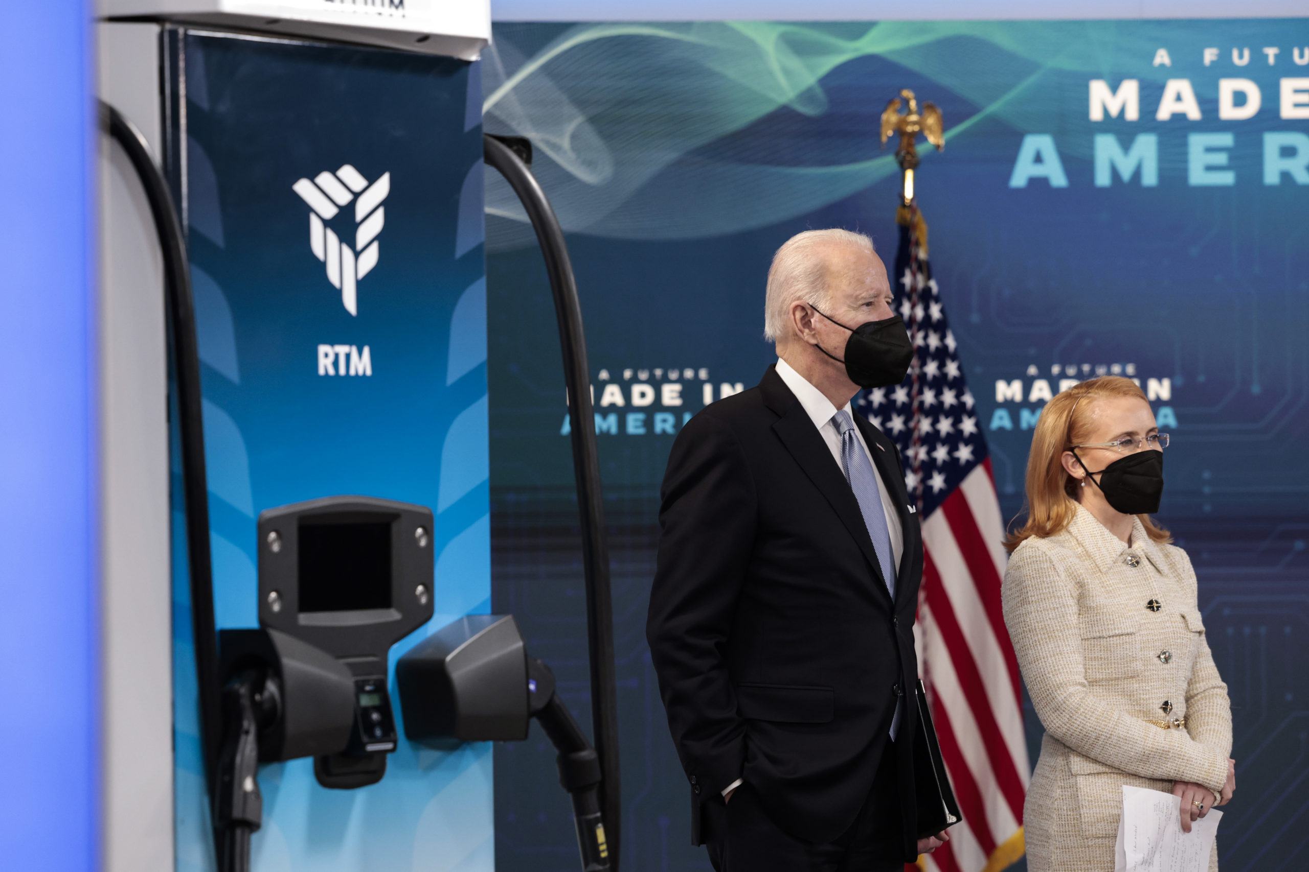 President Joe Biden and Tritium CEO Jane Hunter stand near an electric vehicle charger during an event at the White House on Tuesday. (Anna Moneymaker/Getty Images)