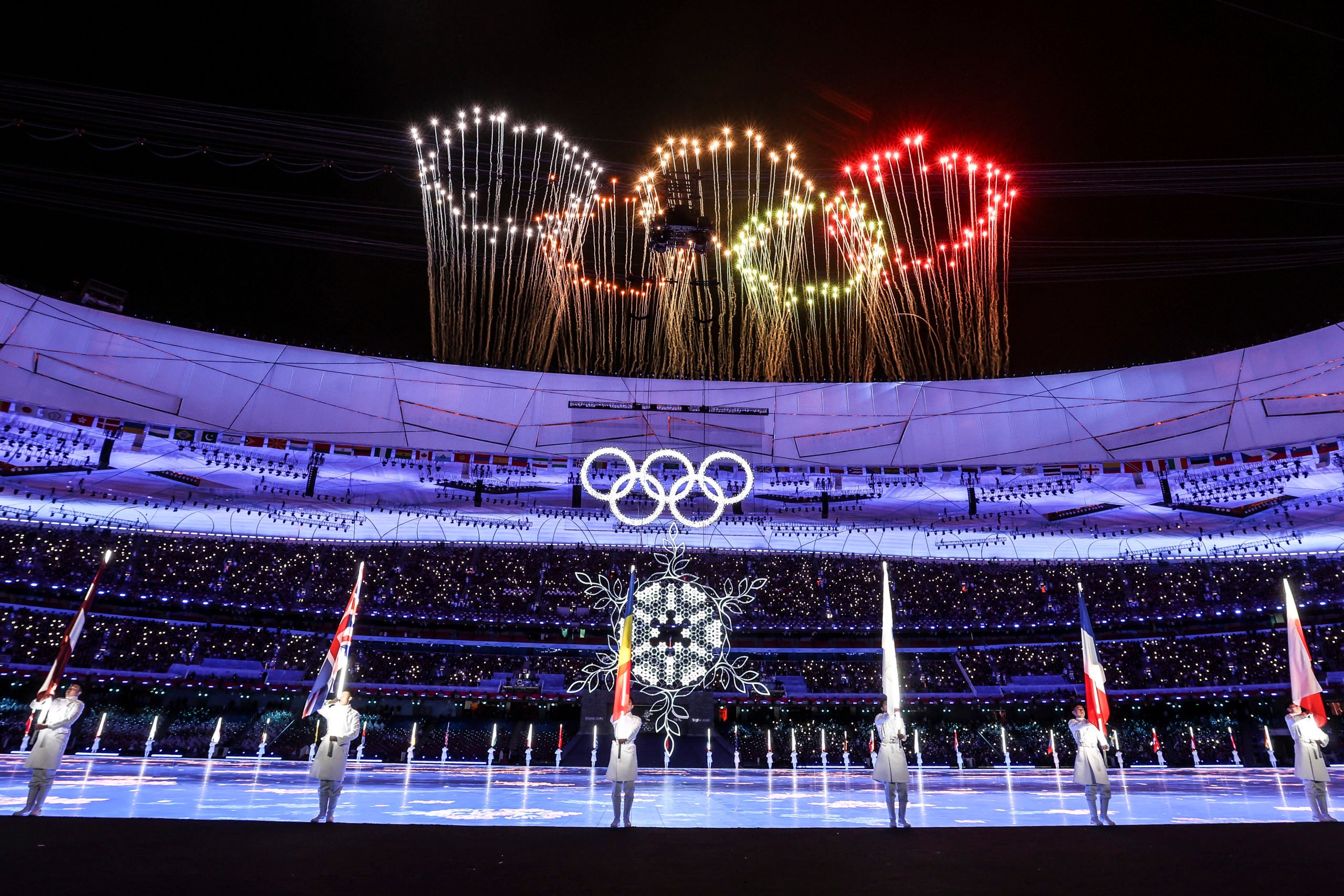BEIJING, CHINA - FEBRUARY 20: A firework display is seen inside the stadium alongside the Olympic rings during the Beijing 2022 Winter Olympics Closing Ceremony on Day 16 of the Beijing 2022 Winter Olympics at Beijing National Stadium on February 20, 2022 in Beijing, China. (Photo by Maja Hitij/Getty Images)