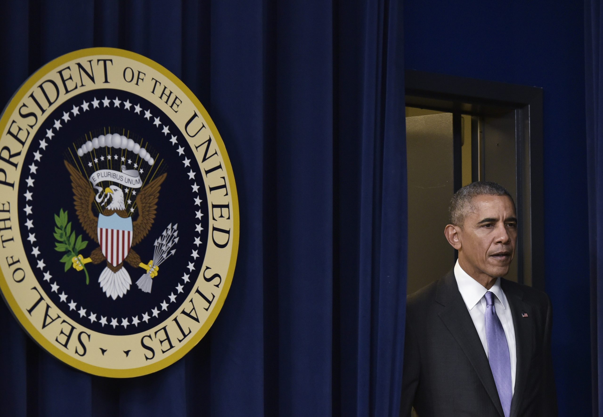 US President Barack Obama arrives for a signing ceremony for the 21st Century Cures Act in the South Court Auditorium, next to the White House on December 13, 2016 in Washington, DC. - The bill speeds up the approval process for new drugs and medical devices and expands funding for medical research, including the cancer moonshot initiative led by Vice President Joe Biden. The funding will also aid research on opioid abuse and brain diseases, including Alzheimers. (Photo by MANDEL NGAN / AFP) (Photo by MANDEL NGAN/AFP via Getty Images)