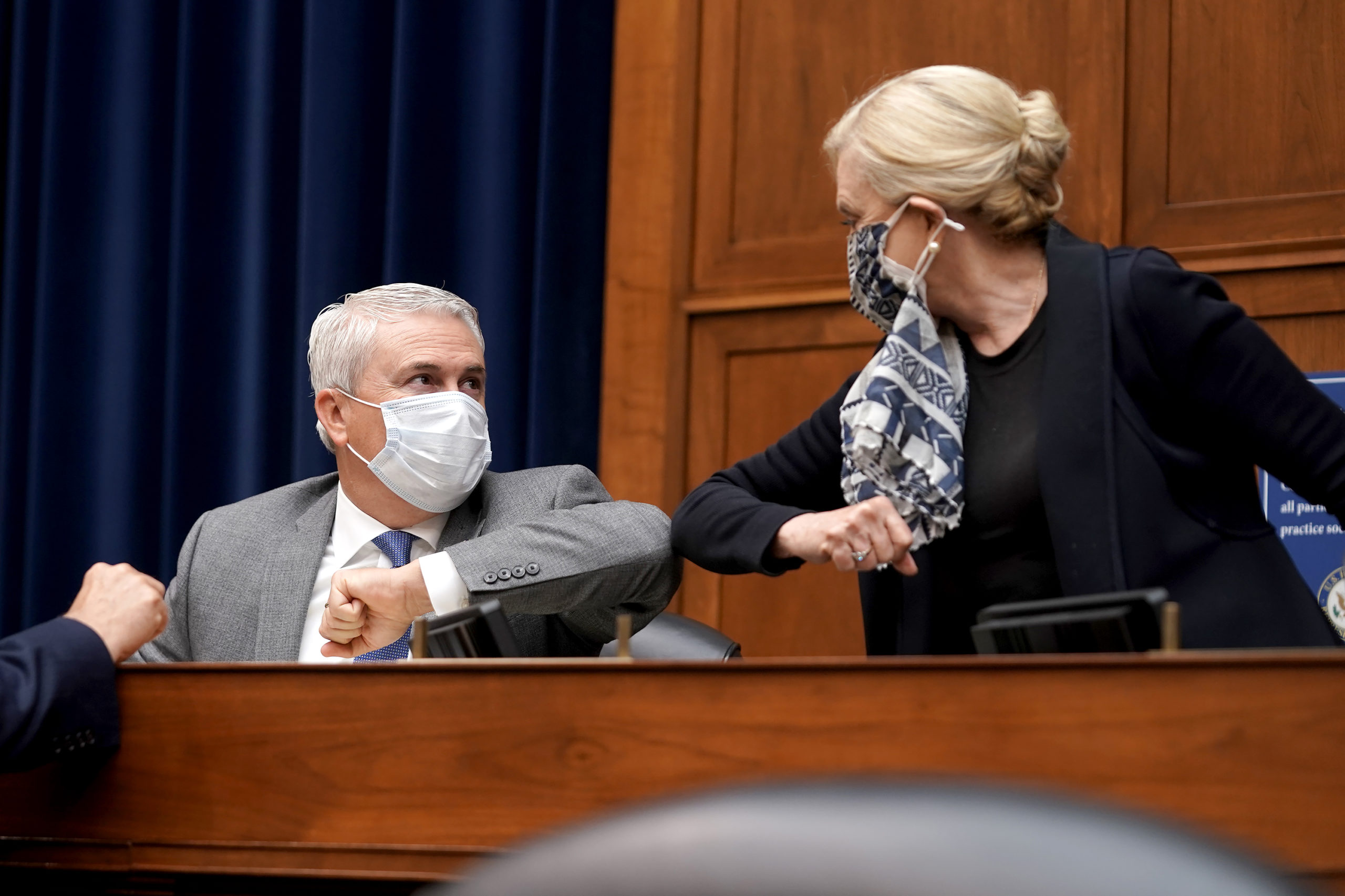 Oversight Ranking Member James Comer elbow bumps Oversight Chairwoman Carolyn Maloney prior to a hearing on Sept. 30, 2020. (Greg Nash/Pool/Getty Images)