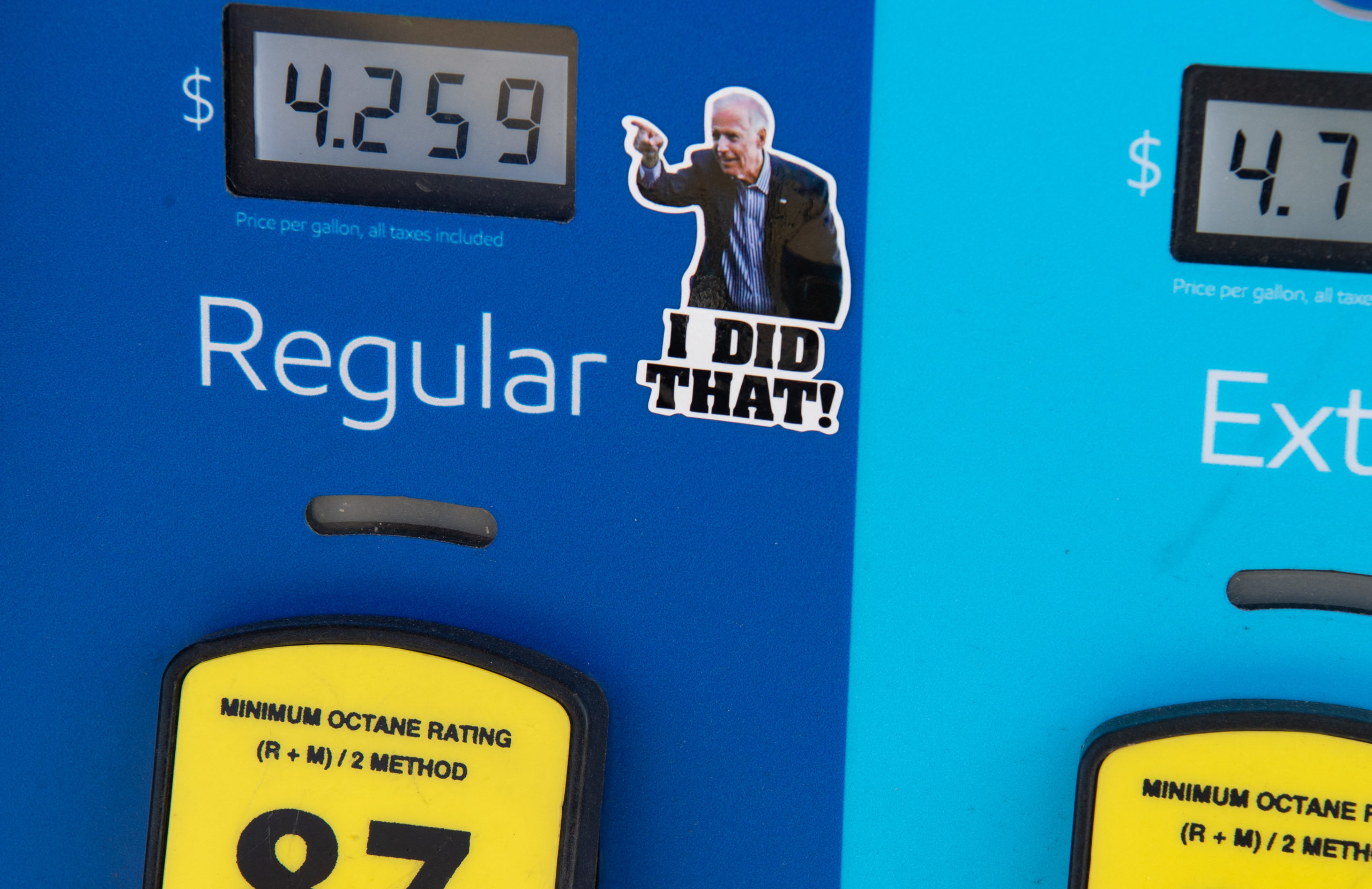 A gas pump displays current fuel prices along with a sticker of President Joe Biden at a gas station in Arlington, Virginia on March 16. (Saul Loeb/AFP via Getty Images)