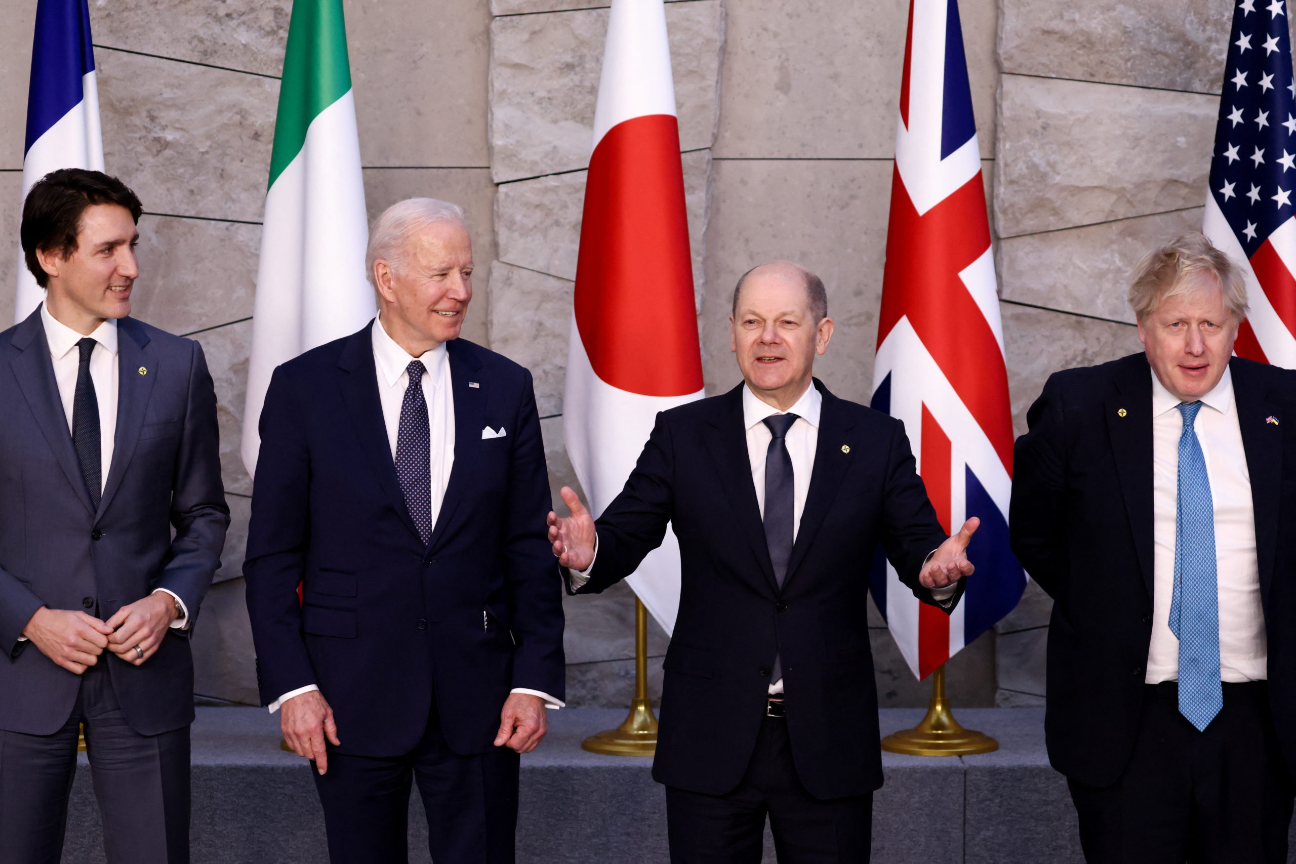 BRUSSELS, BELGIUM - MARCH 24: Canada's Prime Minister Justin Trudeau, U.S. President Joe Biden, Germany's Chancellor Olaf Scholz, and British Prime Minister Boris Johnson pose for a G7 leaders' family photo during a NATO summit on Russia's invasion of Ukraine, at the alliance's headquarters in Brussels, on March 24, 2022 in Brussels, Belgium. Heads of State and Government take part in the North Atlantic Council (NAC) Summit. They will discuss the consequences of President Putin's invasion of Ukraine and the role of China in the crisis. Then decide on the next steps to strengthen NATO's deterrence and defence. (Photo Henry Nicholls - Pool/Getty Images)