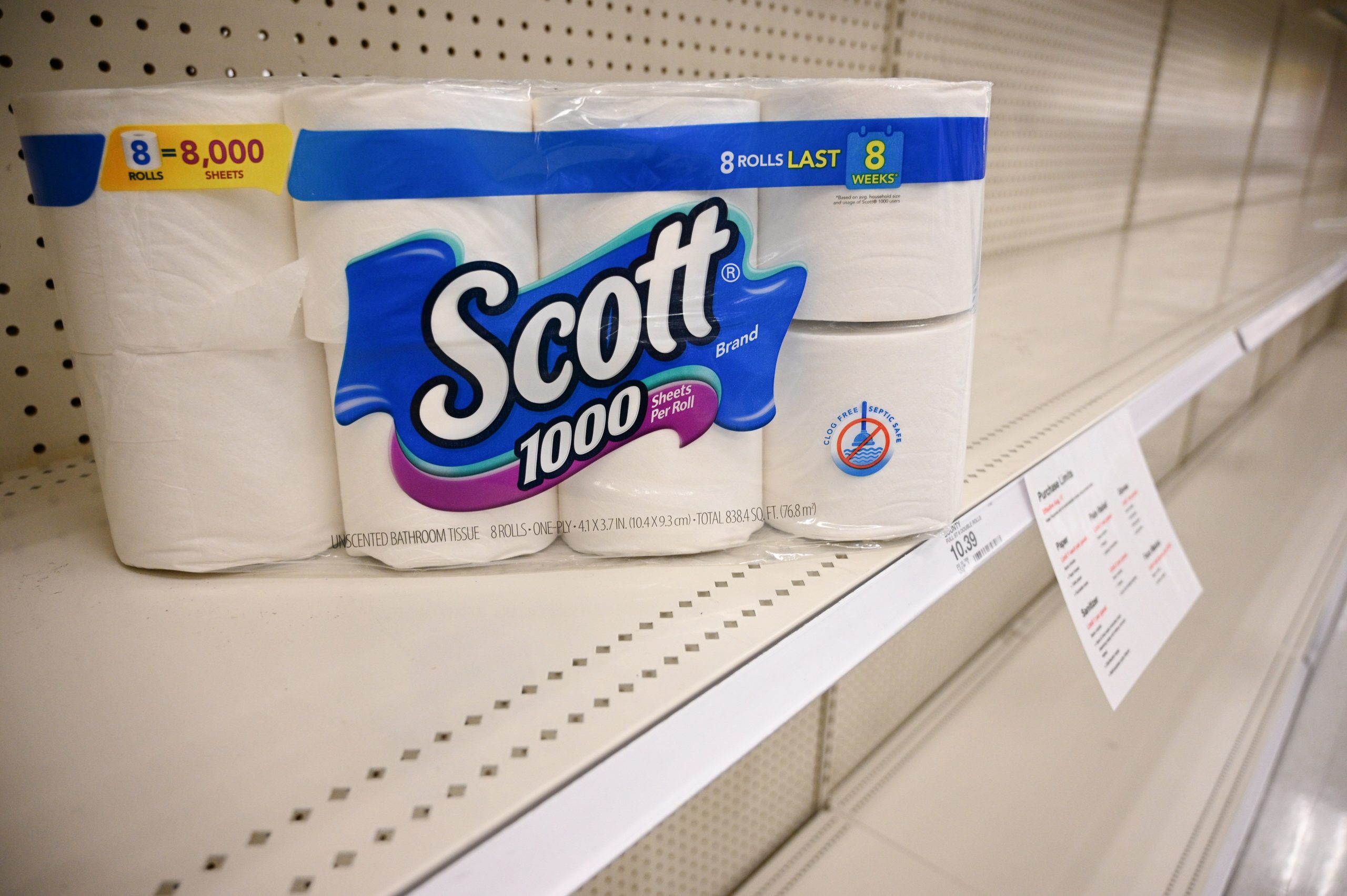 A package of toilet paper sits on an otherwise empty shelf in the paper products aisle of a store in Burbank, California, November 19, 2020. (Photo by ROBYN BECK/AFP via Getty Images)