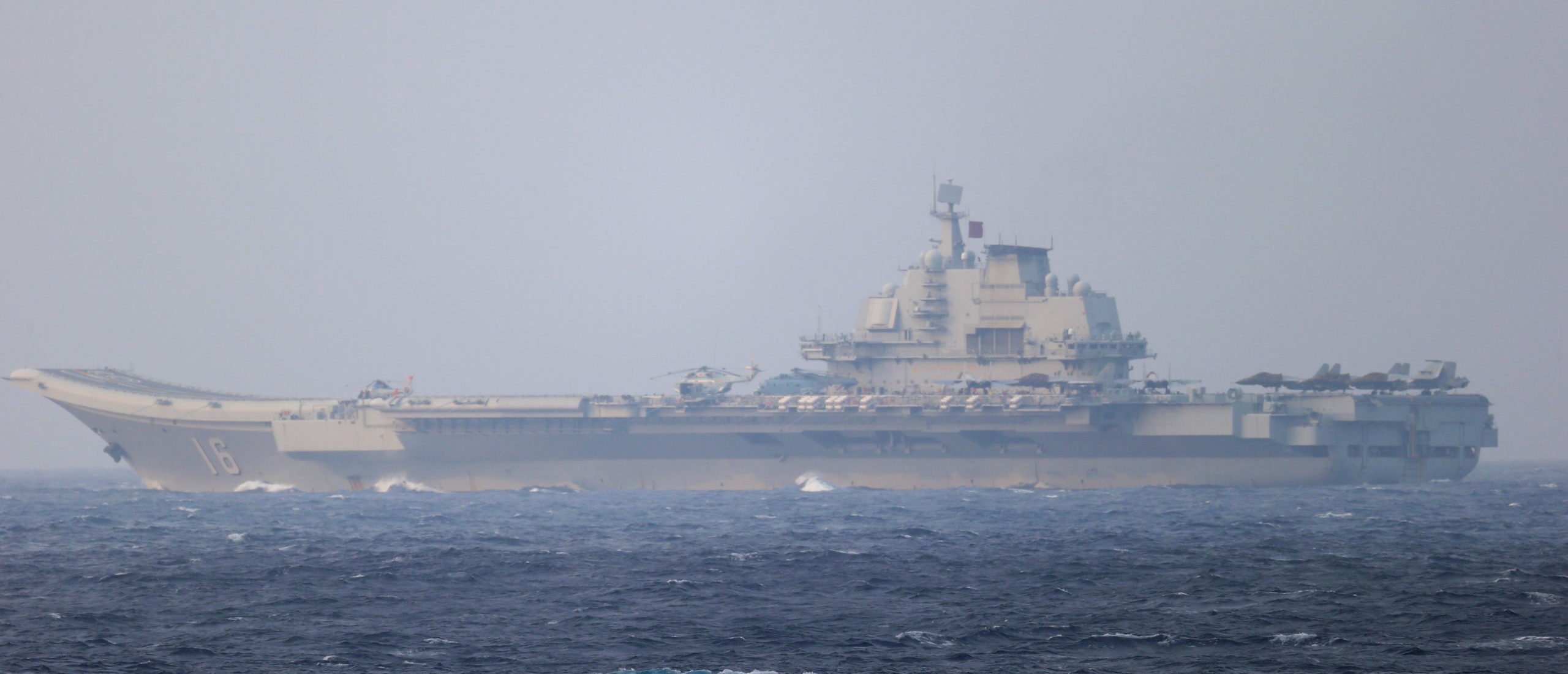Chinese aircraft carrier Liaoning sails through the Miyako Strait near Okinawa on its way to the Pacific in this handout photo taken by Japan Self-Defense Forces and released by the Joint Staff Office of the Defense Ministry of Japan on April 4, 2021. (REUTERS/U.S. Navy)