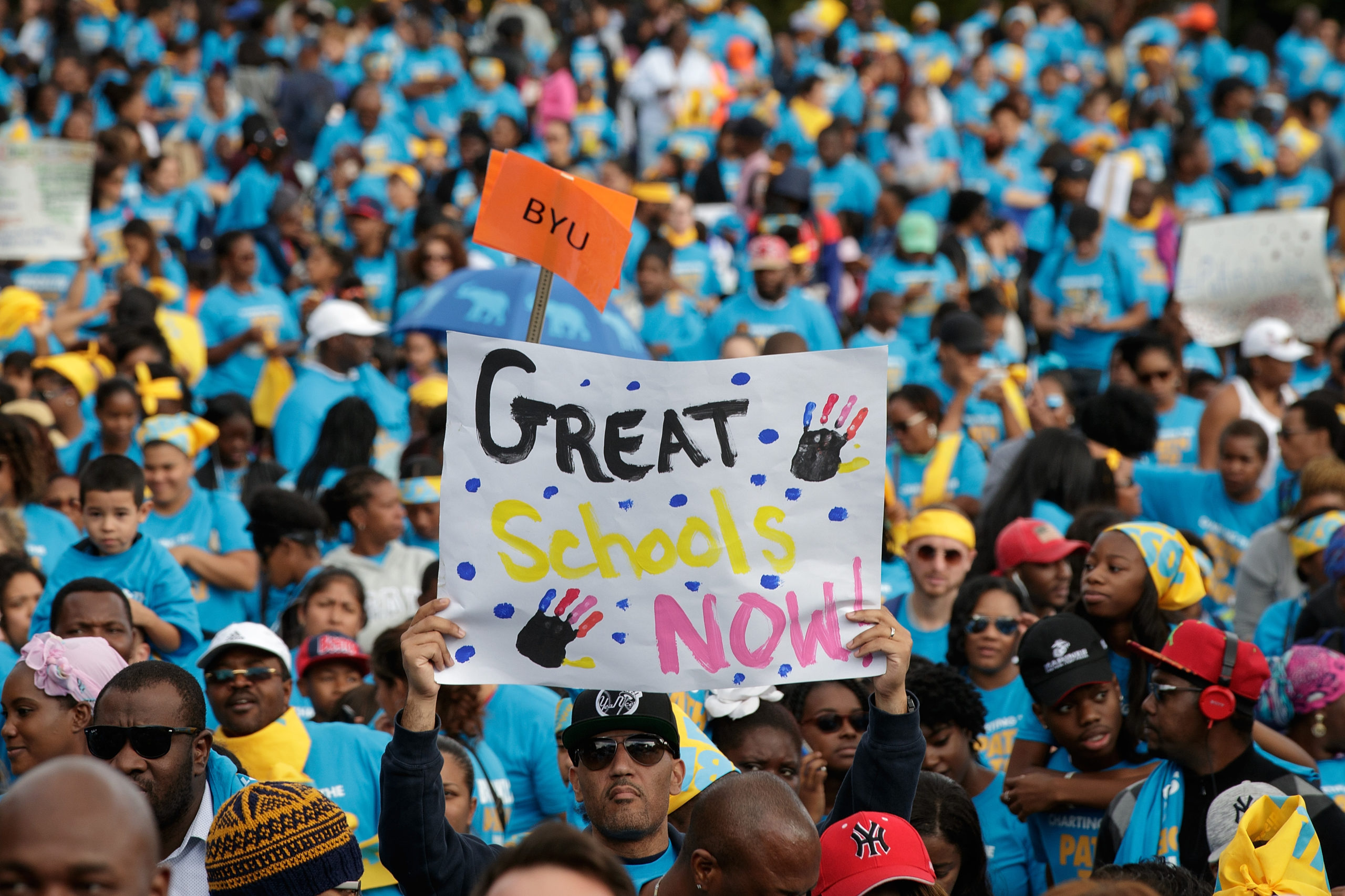 Parents, schoolchildren and education activists rally during an event supporting public charter schools. (Photo by Drew Angerer/Getty Images)