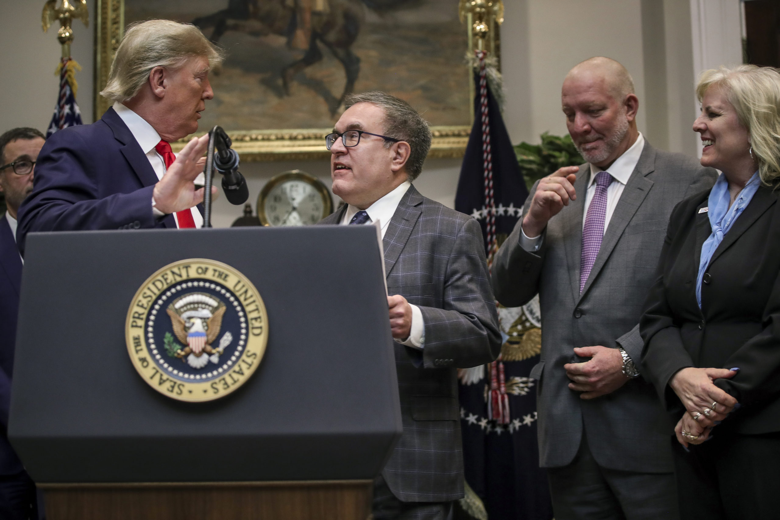 Former President Donald Trump introduces former EPA Administrator Andrew Wheeler at an event to unveil changes to environmental regulations on Jan. 9, 2020. (Drew Angerer/Getty Images)