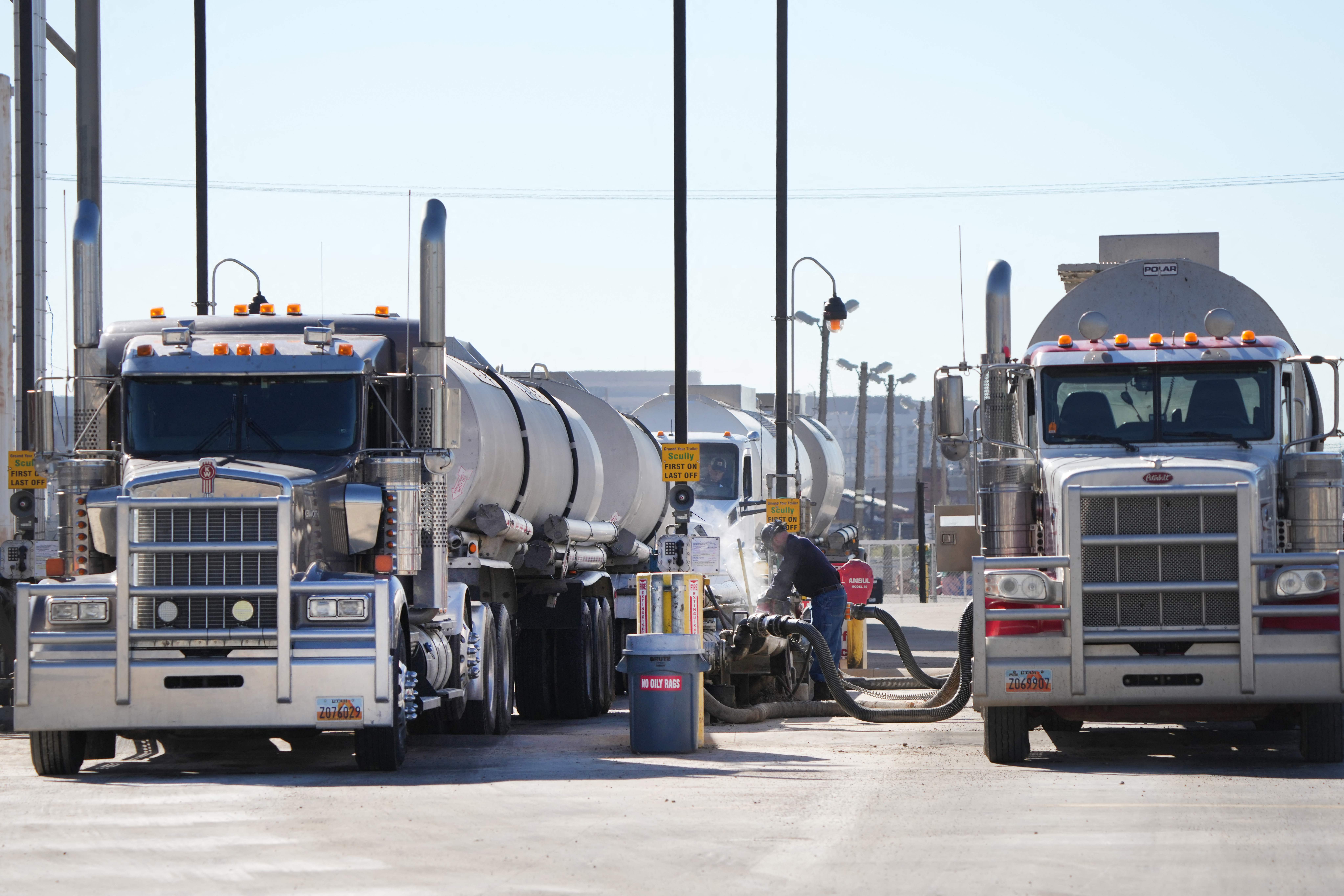 Oil tankers drop off crude oil to be refined into gas at the Marathon Oil Refinery in Salt Lake City, Utah, on Oct. 29, 2021. (George Frey/AFP via Getty Images)