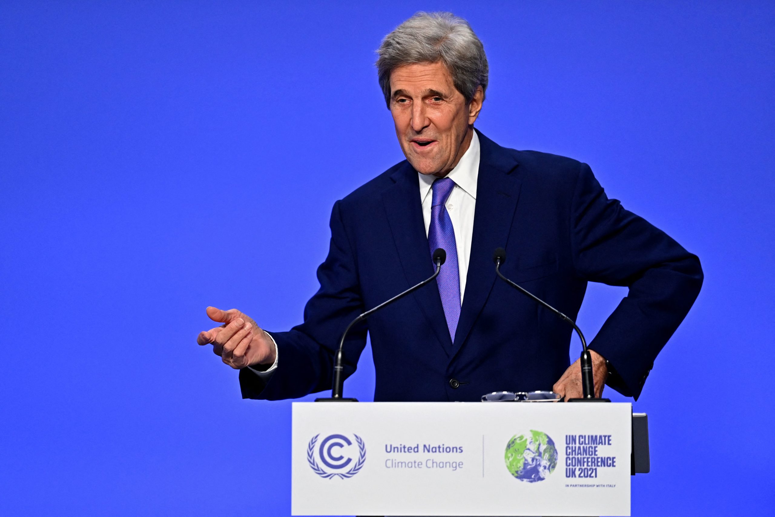 U.S. Climate Envoy John Kerry speaks at a press conference at the COP26 United Nations Climate Change Conference in Glasgow on Nov. 13. (Paul Ellis/AFP via Getty Images)