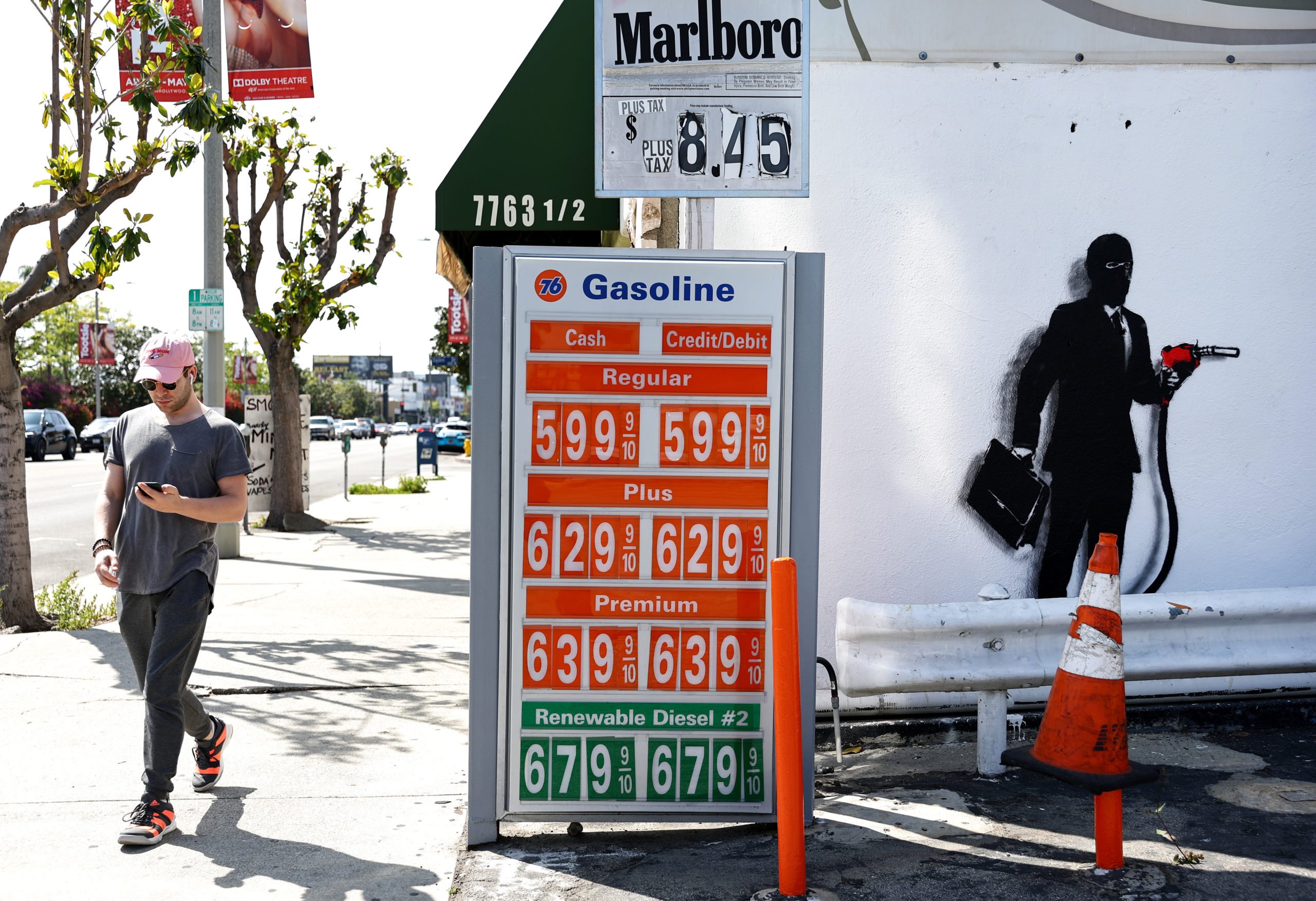 Gas prices are advertised on March 30 in Los Angeles, California. (Mario Tama/Getty Images)