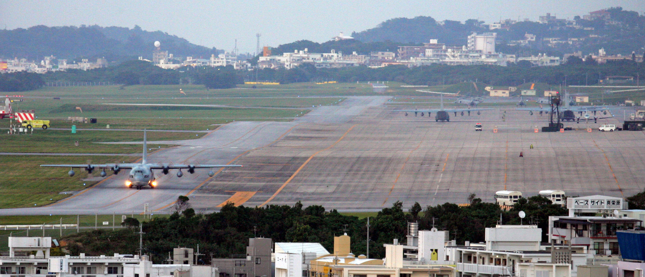 The U.S. military maintains military bases in Japan, including many on Okinawa, according to various sources. A KC-130 Hercules transport plane taxis after returning to the U.S. Futenma air base in Ginowan on the southern Japanese island of Okinawa March 30, 2006. (REUTERS/Issei Kato)