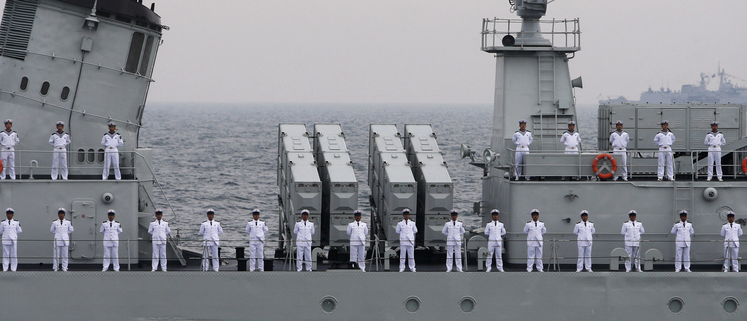 Chinese Navy sailors take part in an international fleet review to celebrate the 60th anniversary of the founding of the People's Liberation Army Navy in Qingdao, Shandong province April 23, 2009. (REUTERS/Guang Niu/Pool)