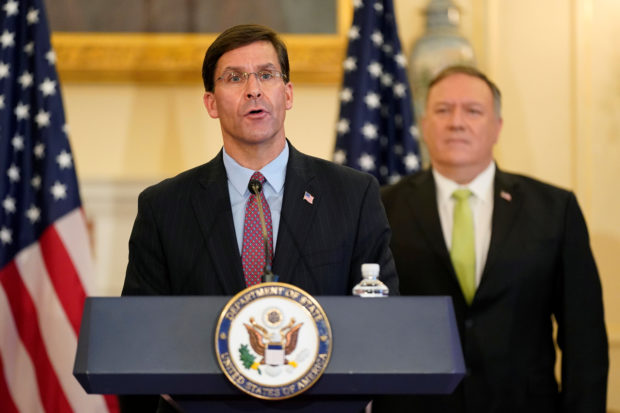 U.S. Defense Secretary Mark Esper speaks next to U.S. Secretary of State Mike Pompeo during a news conference to announce the Trump administration's restoration of sanctions on Iran, at the U.S. State Department in Washington, U.S., September 21, 2020. Patrick Semansky/Pool via REUTERS