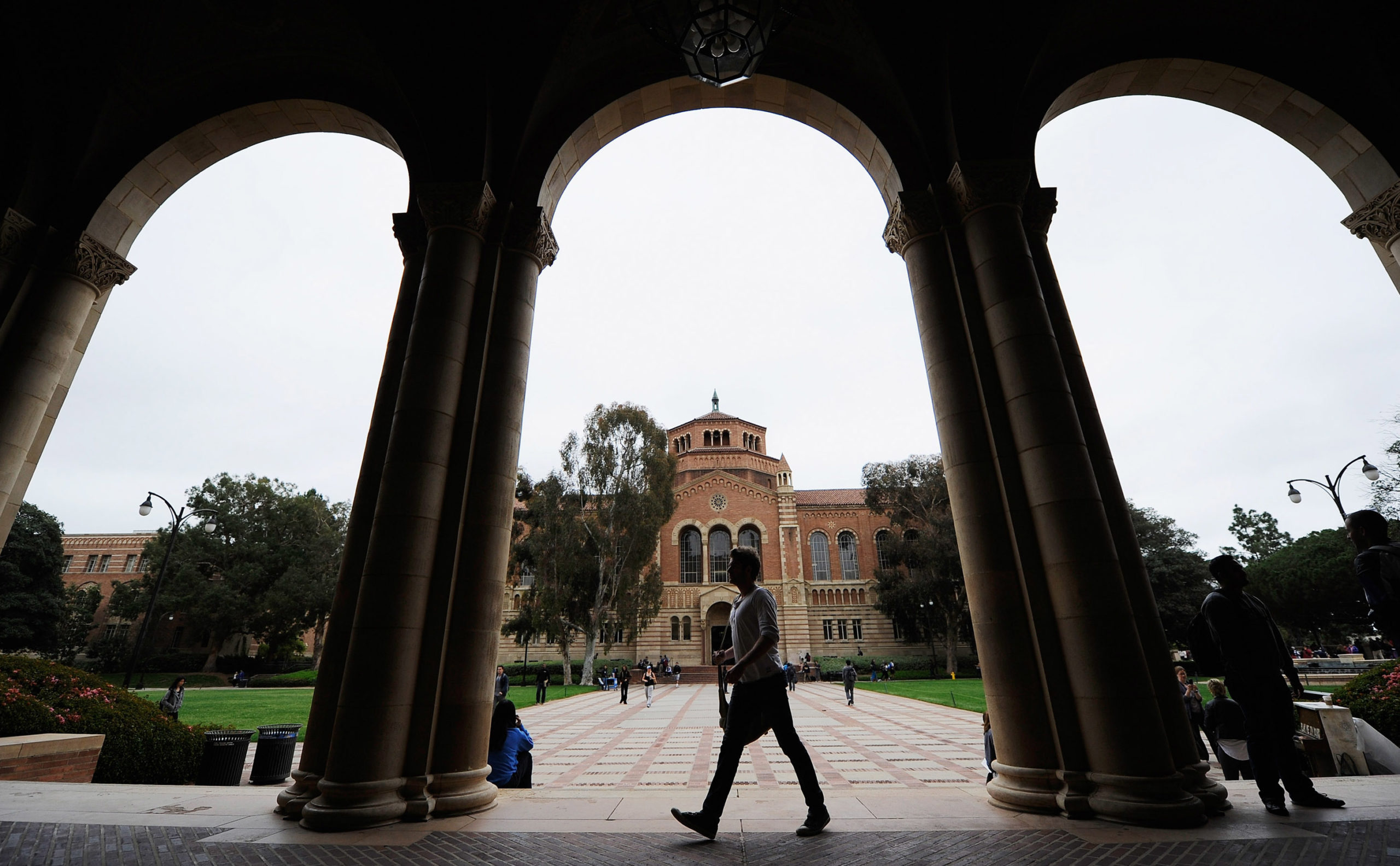 A student walks near Royce Hall on the UCLA campus on April 23, 2012 in Los Angeles, California.  Half of recent college graduates with bachelor's degrees are reportedly underemployed or out of work.  (Photo by Kevork Djansezian/Getty Images)