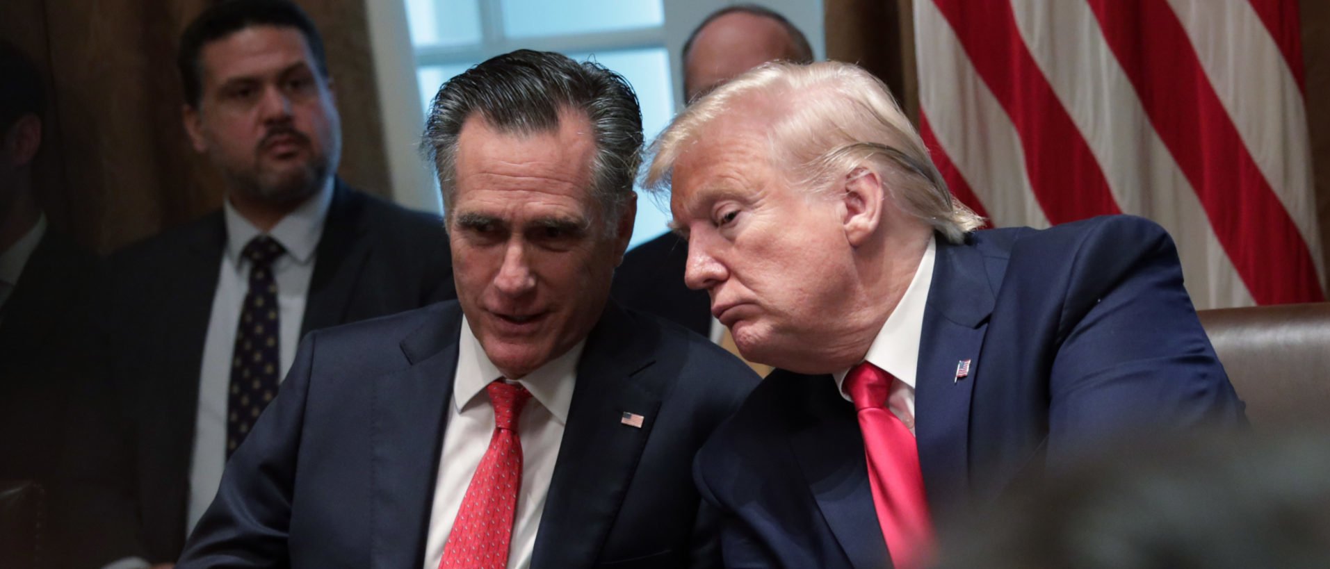 WASHINGTON, DC - NOVEMBER 22: U.S. President Donald Trump (R) listens to Sen. Mitt Romney (R-UT) (L) during a listening session on youth vaping of electronic cigarette on November 22, 2019 in the Cabinet Room of the White House in Washington, DC. President Trump met with business and concern group leaders to discuss on how to regulate vaping products and keep youth away from them. (Photo by Alex Wong/Getty Images)