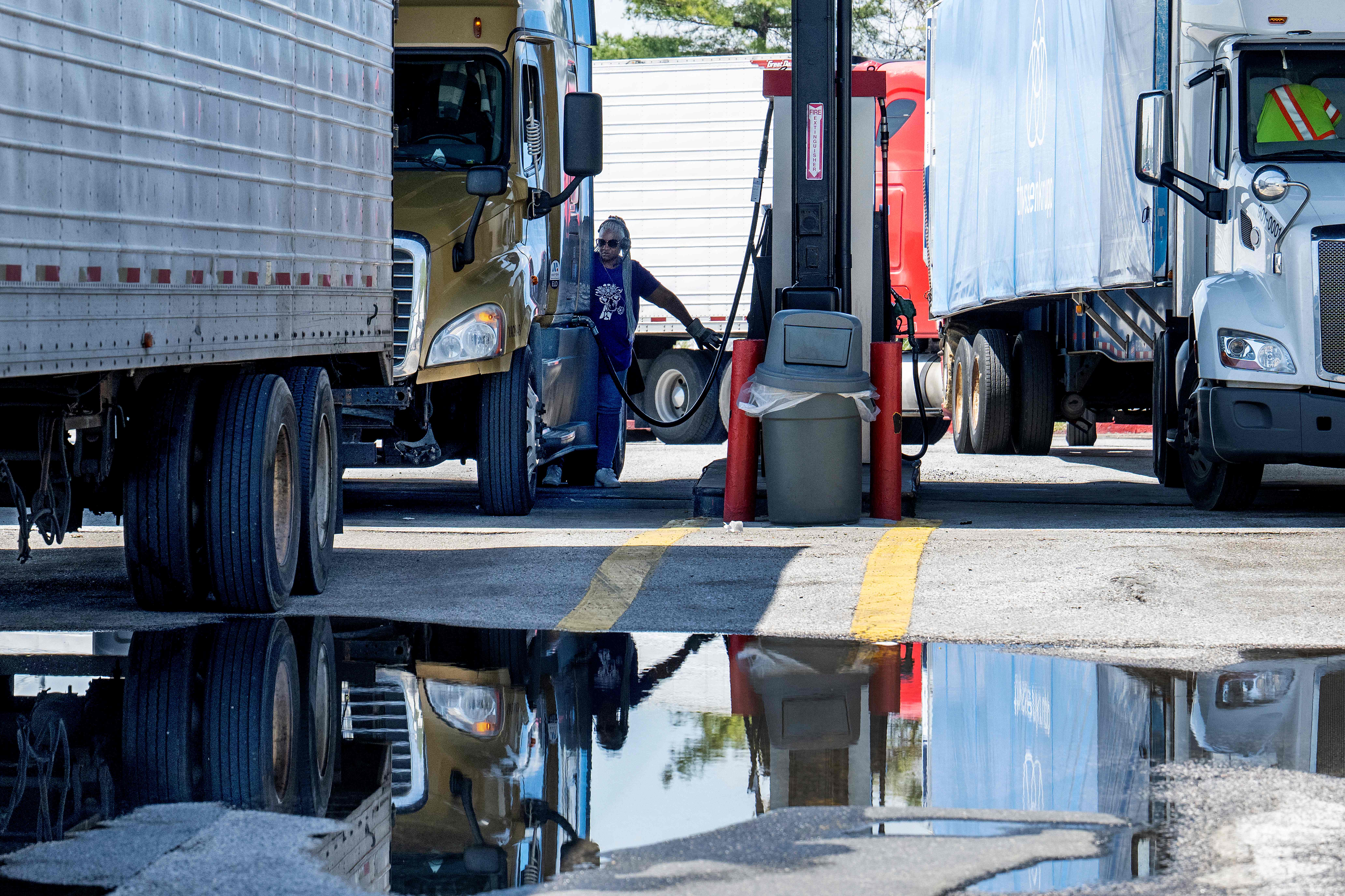 Semi trucks pull into a gas station in Jessup, Maryland, on May 2. (Jim Watson/AFP via Getty Images)