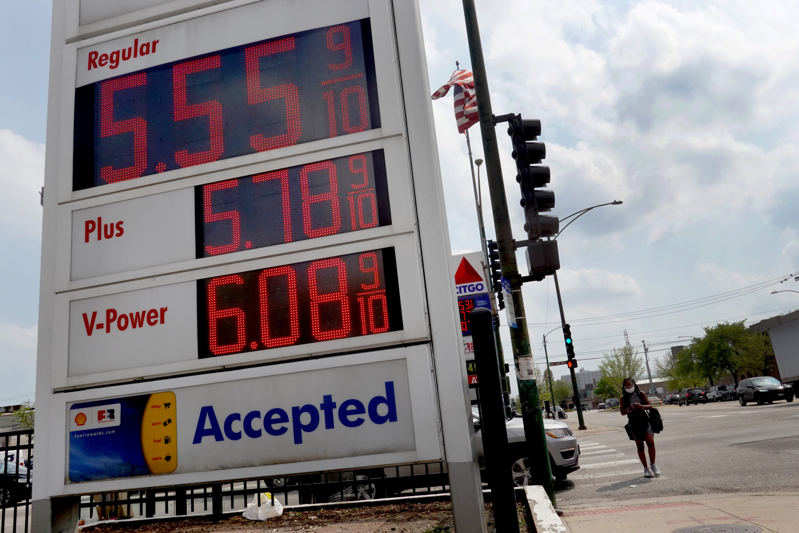 A sign displays gas prices at a station in Chicago on Tuesday. (Scott Olson/Getty Images)