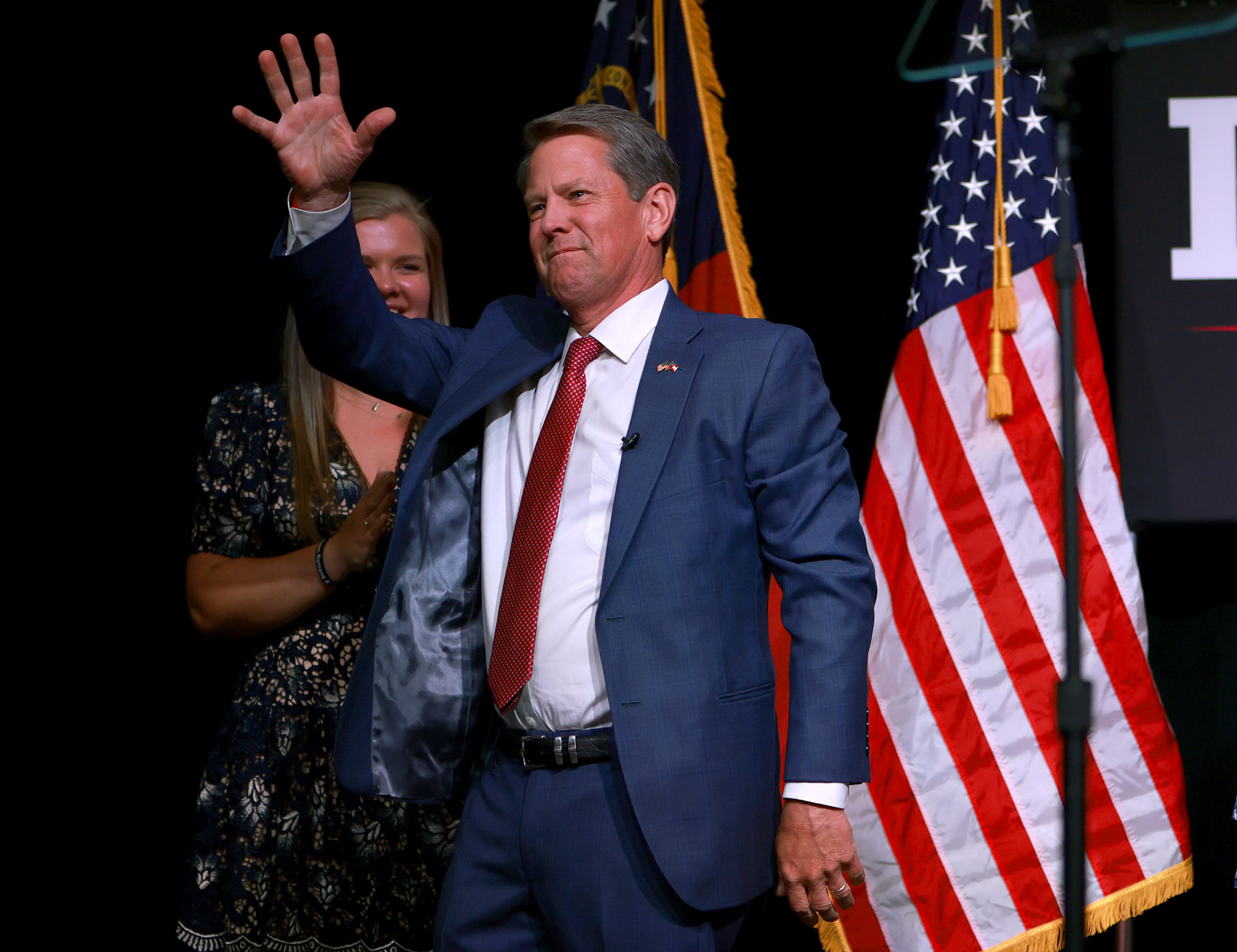 Republican gubernatorial candidate Gov. Brian Kemp waves during his primary night election party at the Chick-fil-A College Football Hall of Fame on May 24, 2022 in Atlanta, Georgia. (Photo by Joe Raedle/Getty Images)