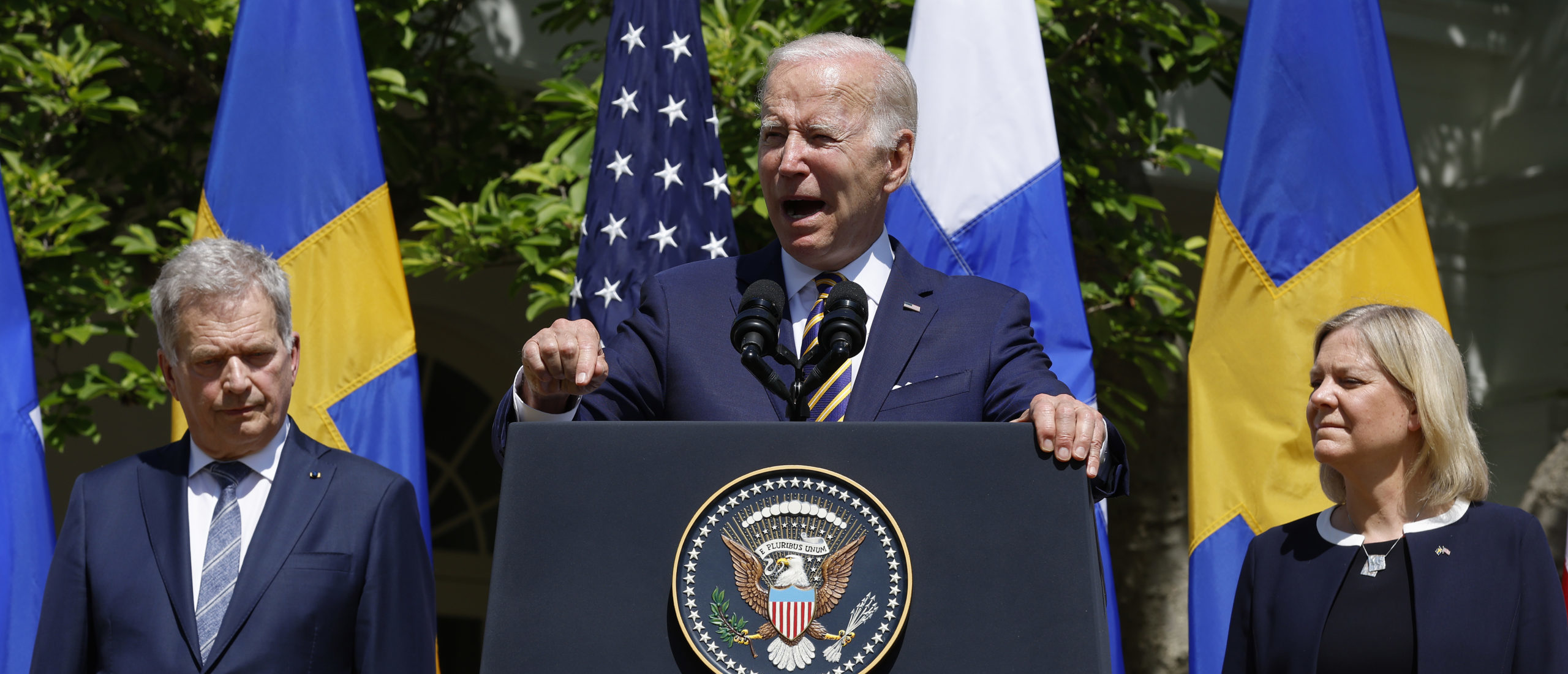 U.S. President Joe Biden (C) delivers remarks with Finland's President Sauli Niinisto (L) and Sweden's Prime Minister Magdalena Andersson in the Rose Garden at the White House on May 19, 2022 in Washington, DC. (Photo by Chip Somodevilla/Getty Images)