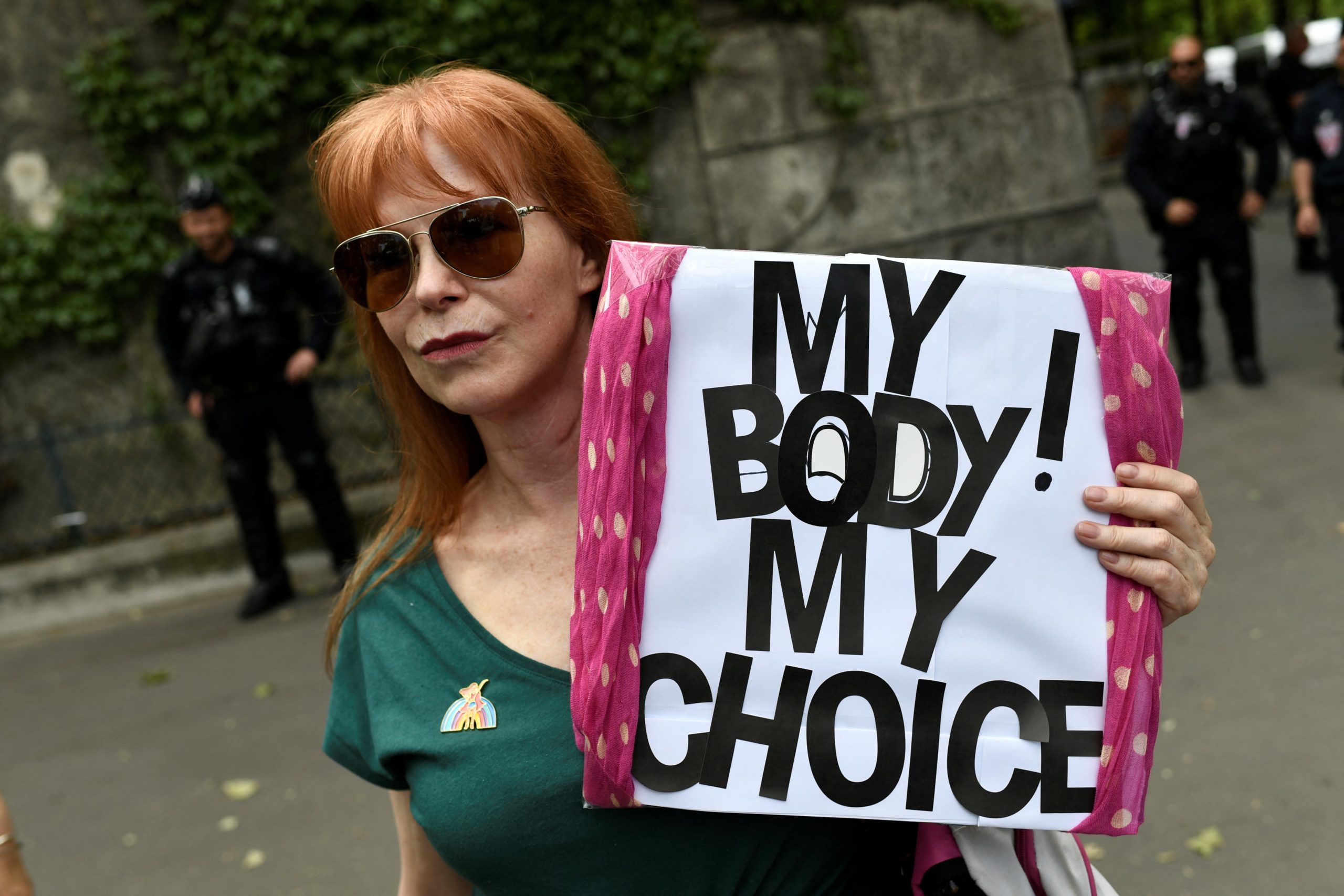 A woman takes part in a rally in support of abortion rights in the US in Paris, on May 15, 2022. - Thousands of activists took the streets across the United States in reaction to a leaked draft opinion showing the Supreme Court's conservative majority is poised to overturn Roe v. Wade, a landmark 1973 ruling guaranteeing abortion access nationwide. (Photo by STEPHANE DE SAKUTIN/AFP via Getty Images)