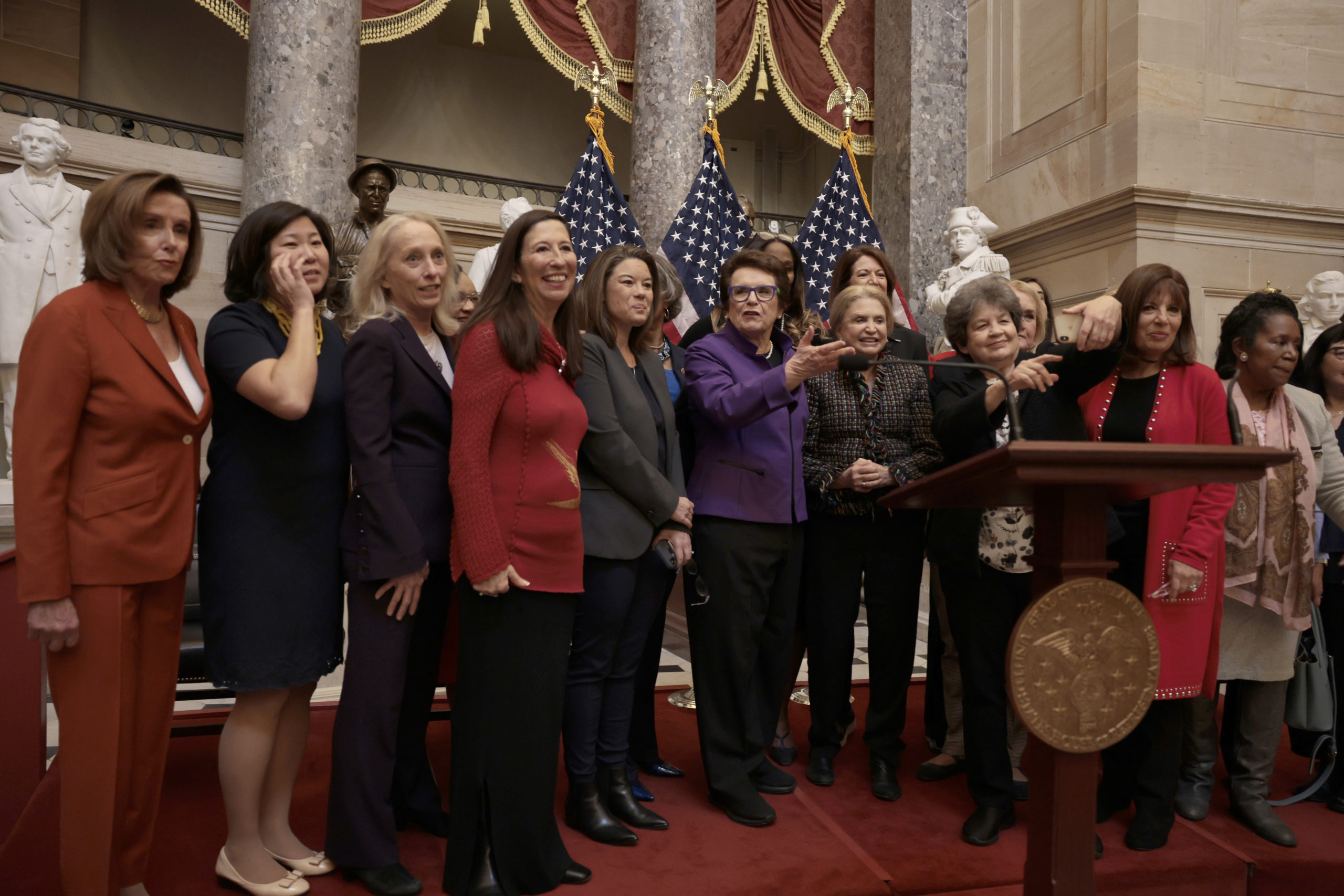 House Speaker Nancy Pelosi (D-CA) (L) and former professional tennis player Billie Jean King (6th L) pose for a photo with members of Congress at a Women's History Month event at the U.S. Capitol Building on March 09, 2022 in Washington, DC. Speaker Pelosi held the event to celebrate women athletes, including King and to honor the 50th Anniversary of the passage of Title IX. (Photo by Anna Moneymaker/Getty Images)