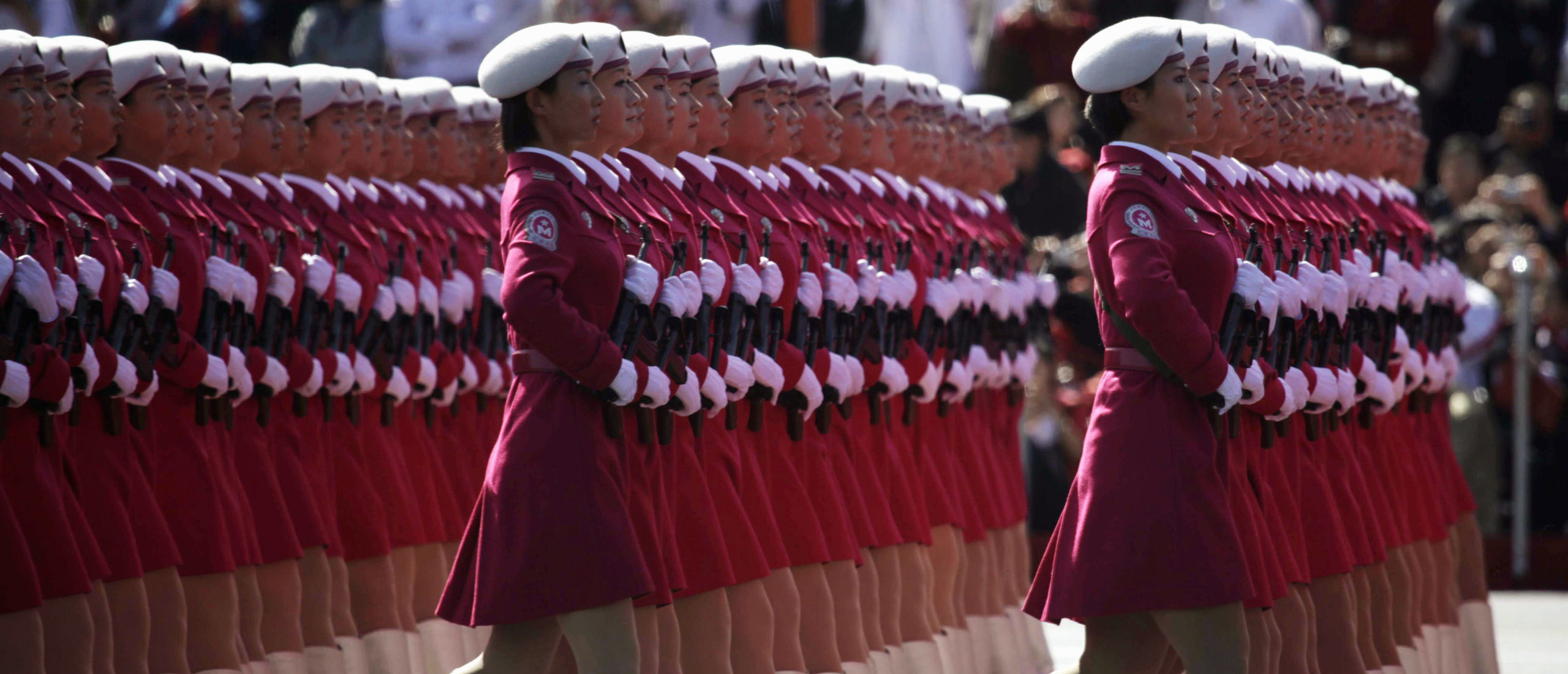 Female members of a Chinese militia march in formation past Tiananmen Square during a massive parade to mark the 60th anniversary of the founding of the People's Republic of China, in Beijing October 1, 2009. (REUTERS/Nir Elias)