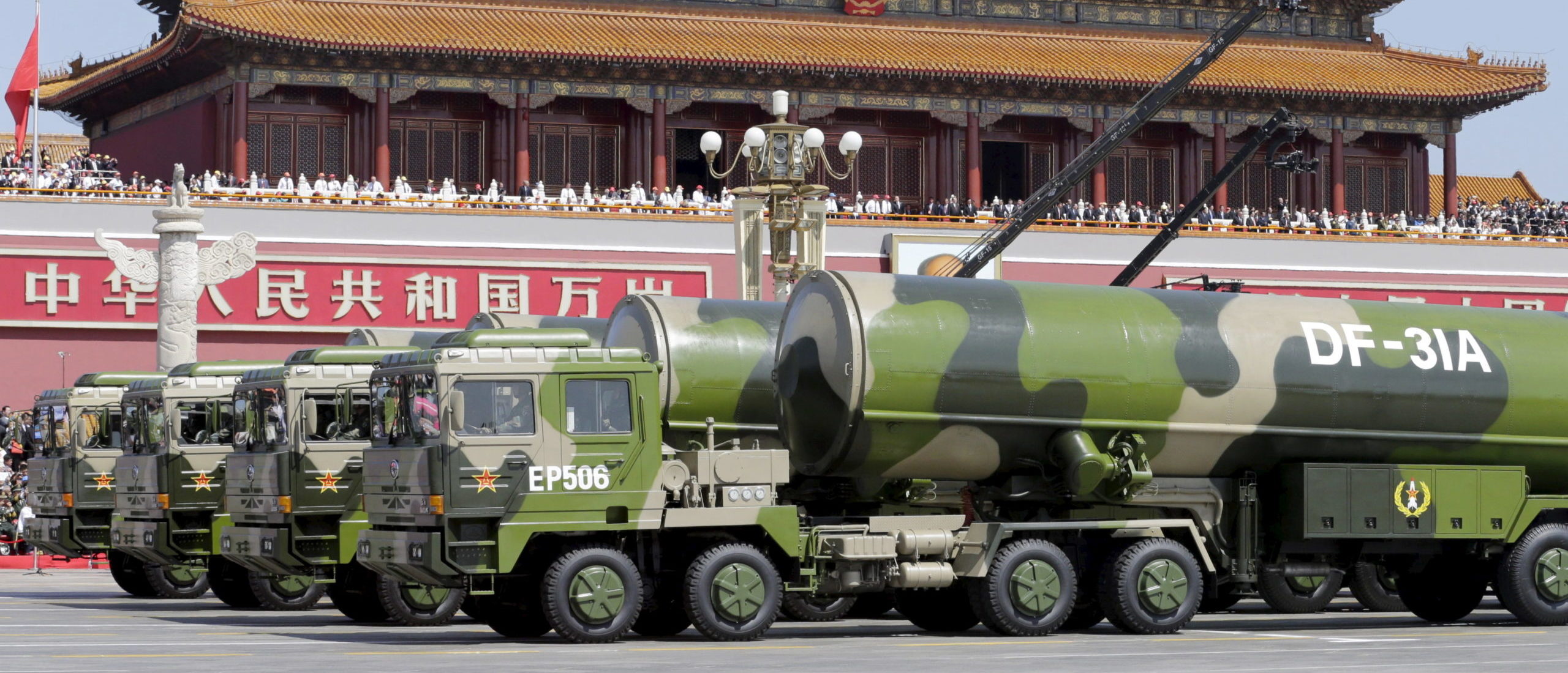 Military vehicles carrying DF-31A long-range missiles drive past the Tiananmen Gate during a military parade to mark the 70th anniversary of the end of World War Two, in Beijing, China, September 3, 2015. (REUTERS/Jason Lee)