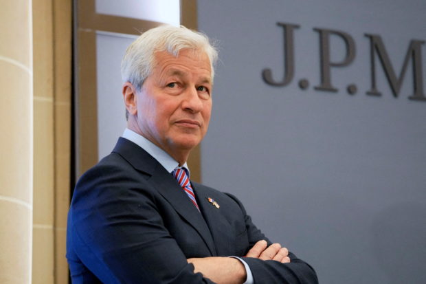 FILE PHOTO: Morgan CEO Jamie Dimon looks on during the inauguration the new French headquarters of JP Morgan bank in Paris, France June 29, 2021. Michel Euler/Pool via REUTERS