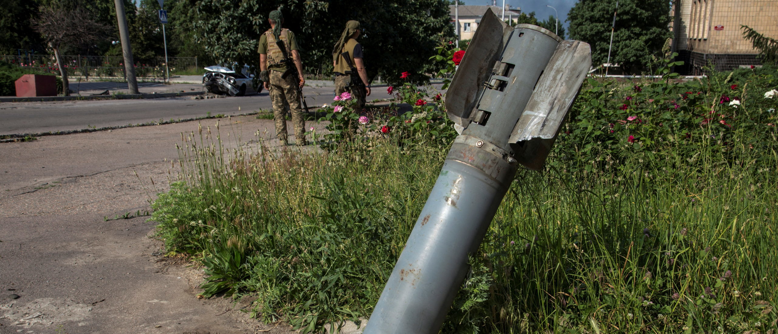 An unexploded shell from a multiple rocket launch system is seen stuck in the ground, as Russia's attack on Ukraine continues, in the town of Lysychansk, Luhansk region, Ukraine June 10, 2022. (REUTERS/Oleksandr Ratushniak)